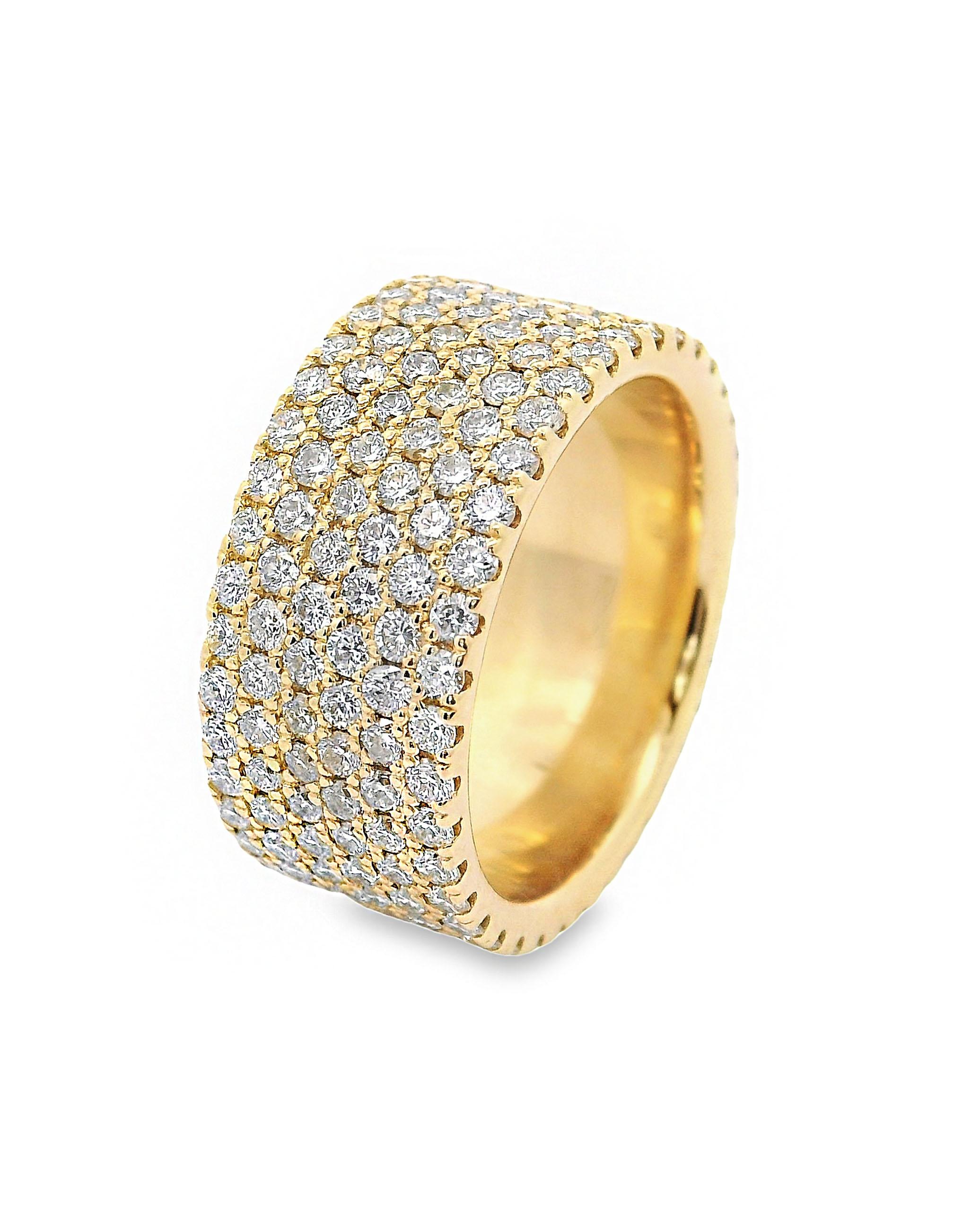 14K yellow gold eternity ring with 6 rows of round brilliant-cut pave set diamonds weighing 3.40 carats total.

- Finger size 6
- 9mm wide
- Diamonds are G/H color, SI1 clarity