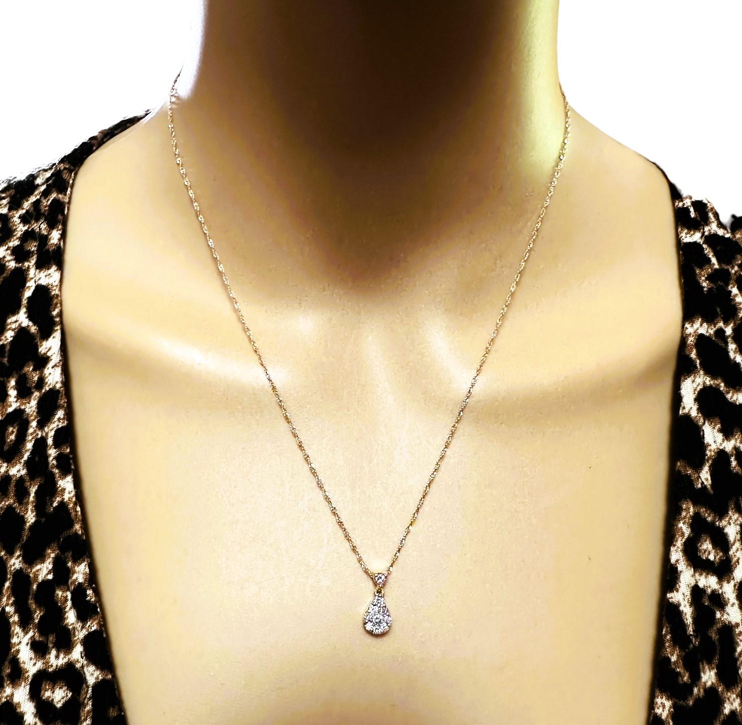 This pendant is just so beautiful!!  I just love the teardrop design .  And it's on a beautiful chain.  It has 10 Brilliant cut diamonds the largest being approximately 2.5 mm.  They are just bright and sparkly.  It is on a very well-made 14k Yellow