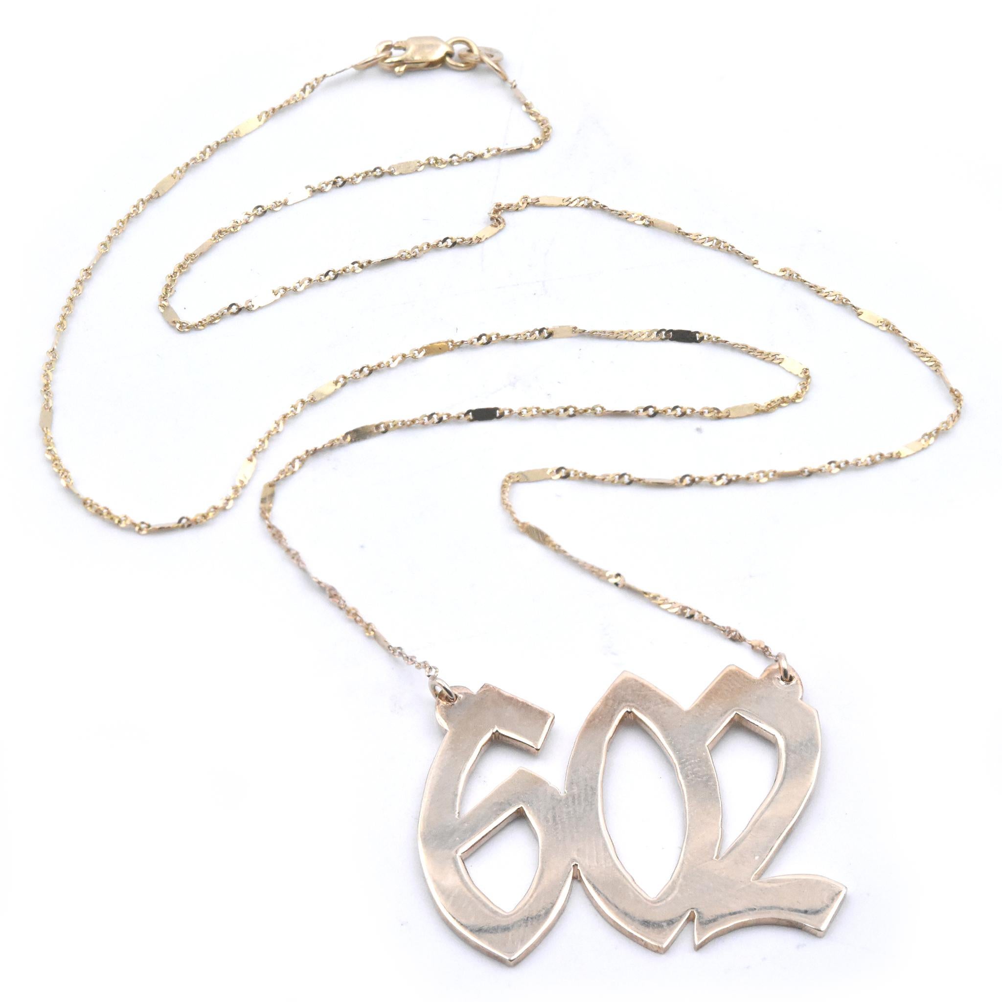 Designer: Custom Design
Material: 14k yellow gold
Dimensions: necklace measures 16-inches in length
Weight: 6.04 grams