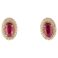Clous d'oreilles en or jaune 14 carats, tourmaline rose 6,46 carats et diamants 0,61 carat