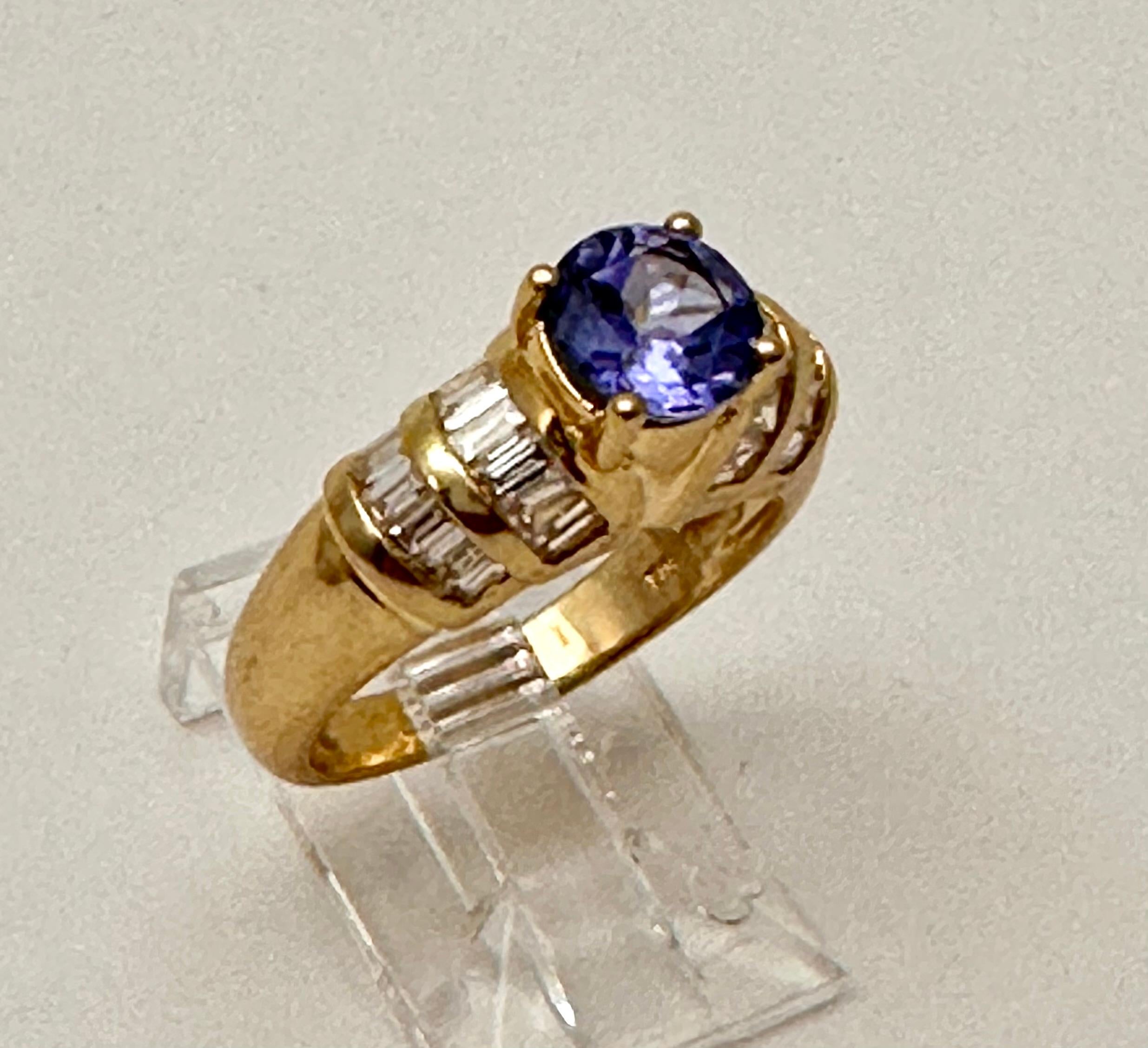 Modern 14k Yellow Gold 6.5mm Round Tanzanite Diamond Ring Size 6.5  For Sale