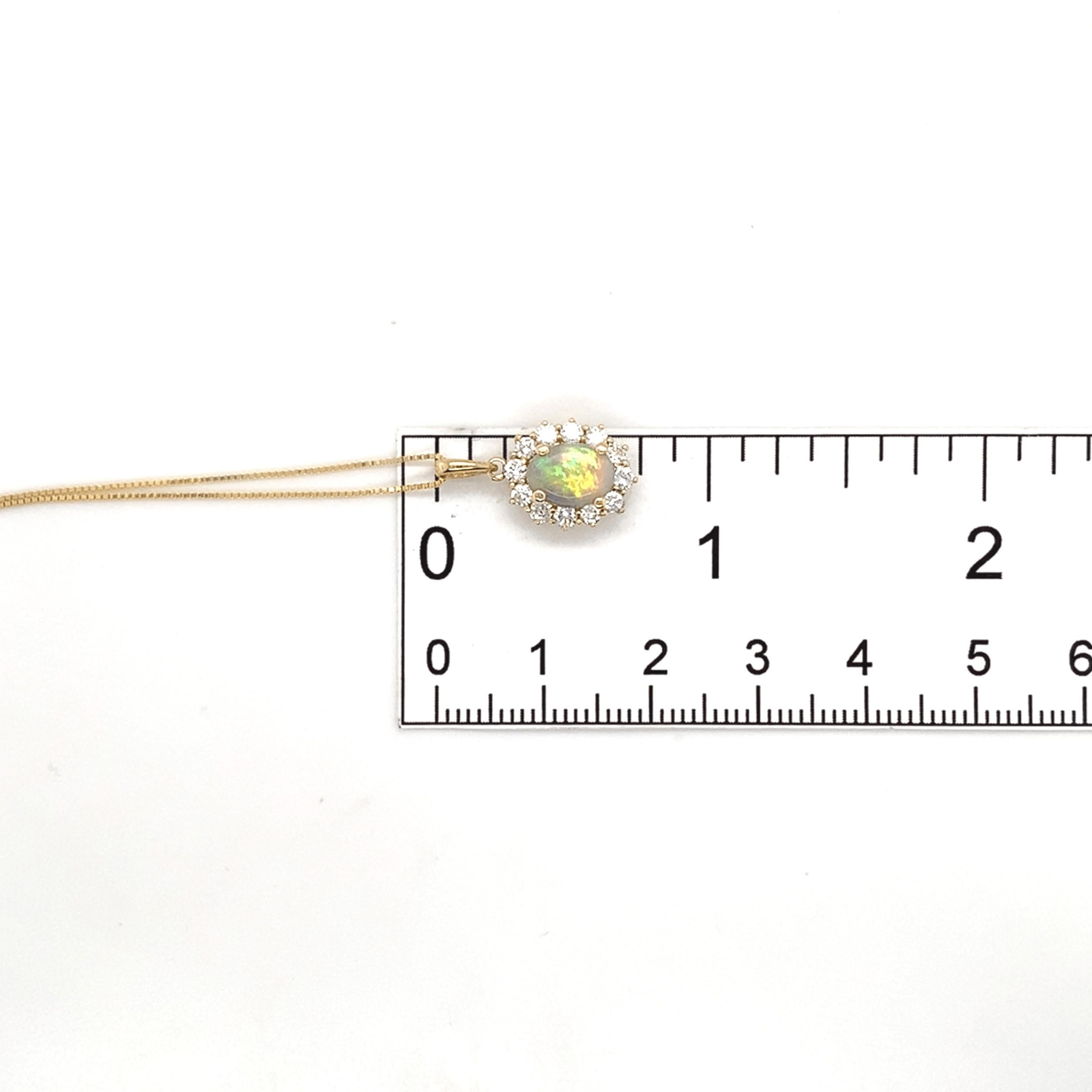 Ciondolo in oro giallo 14K con opale australiano da 0,67 carati e aureola di diamanti da 0,46 carati in vendita 3