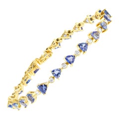 Bracelet en or jaune 14 carats, diamants de 7/8 carats et tanzanite triangulaire bleue