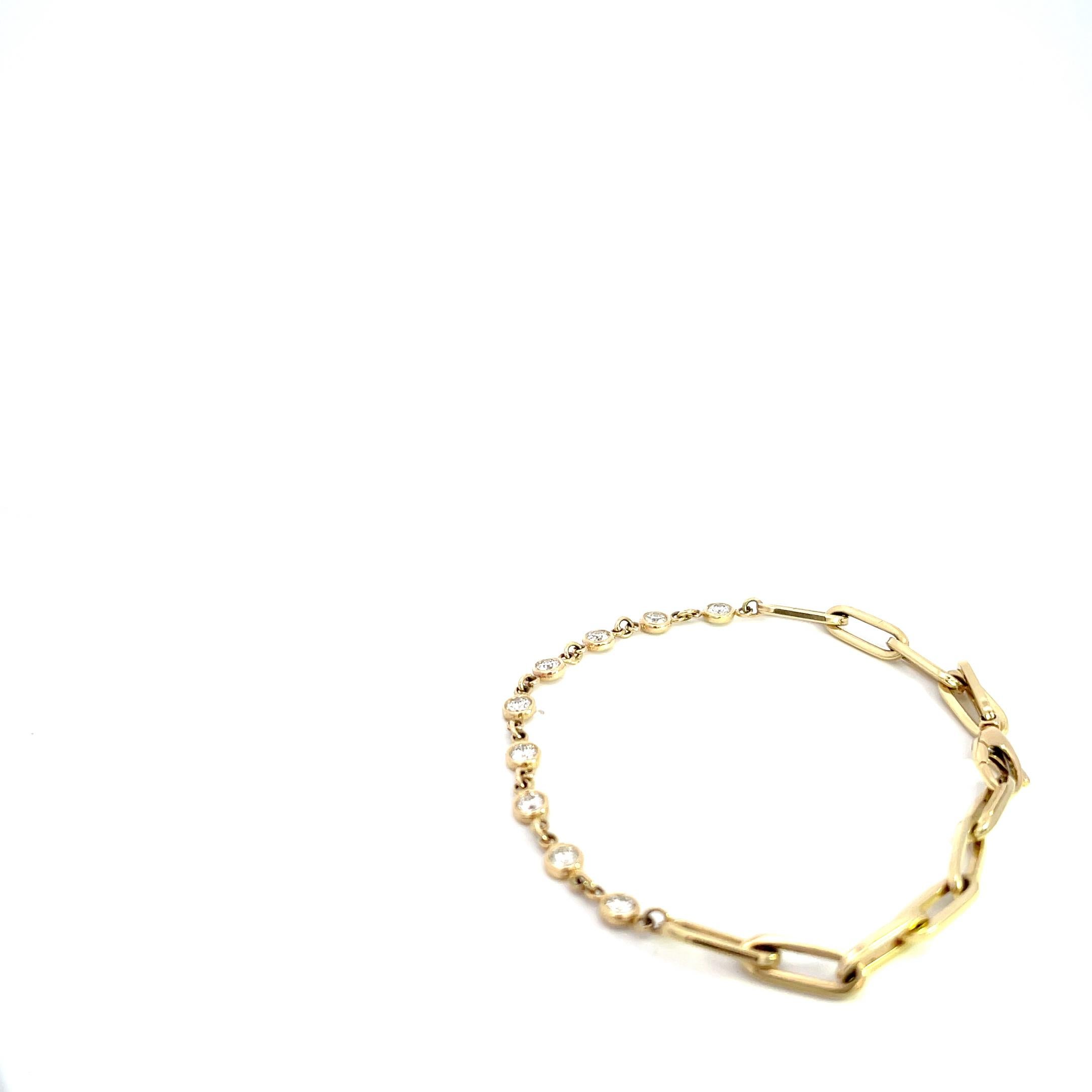 Introducing our exquisite 14K Yellow Gold 0.86ctw Diamond Bezel Paper Clip Bracelet – the epitome of elegance and sophistication. Crafted with the utmost attention to detail, this bracelet is a true masterpiece that will elevate your style to new