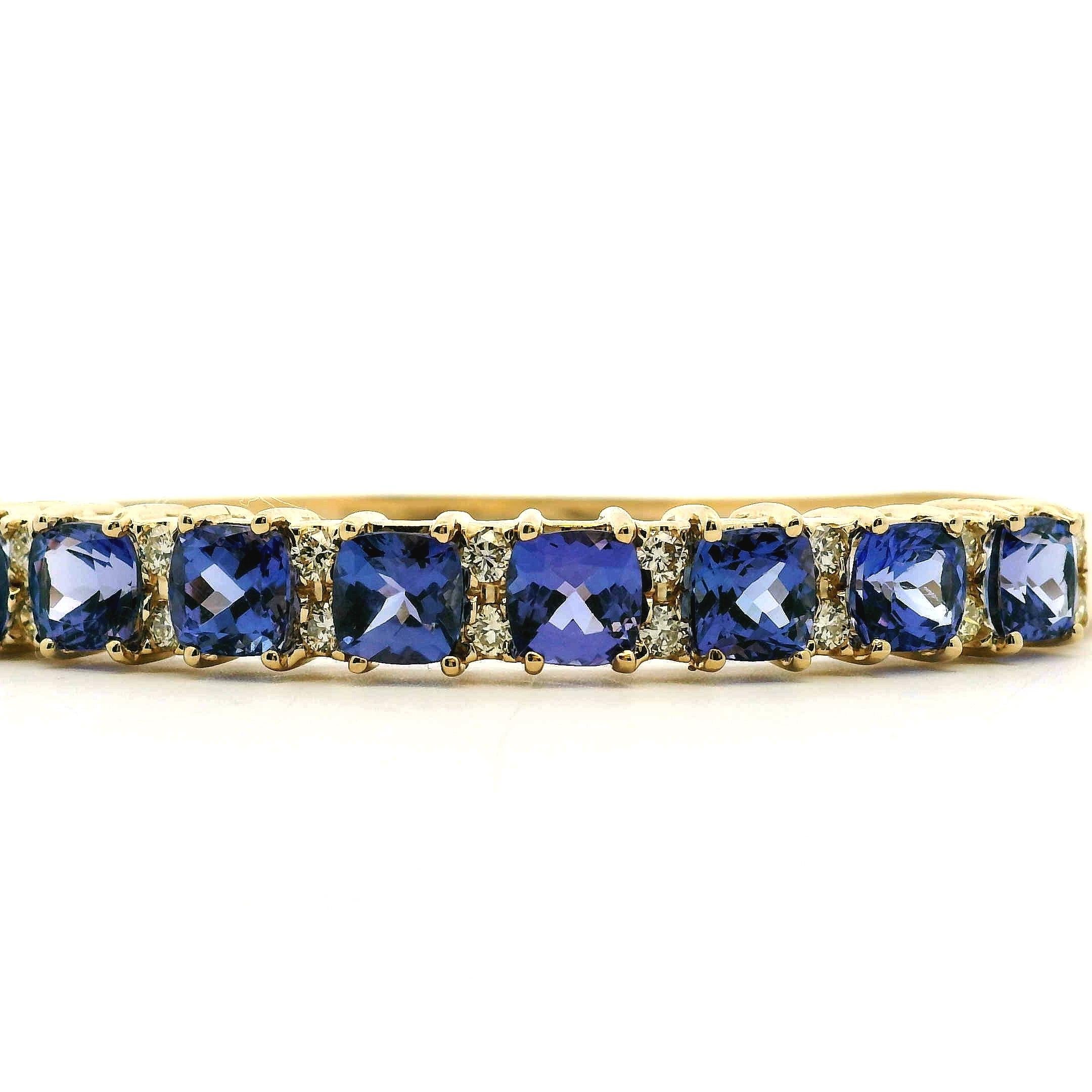 Modern 14k Yellow Gold 7.10ctw Tanzanite and 0.65ctw Round Diamond Bangle For Sale