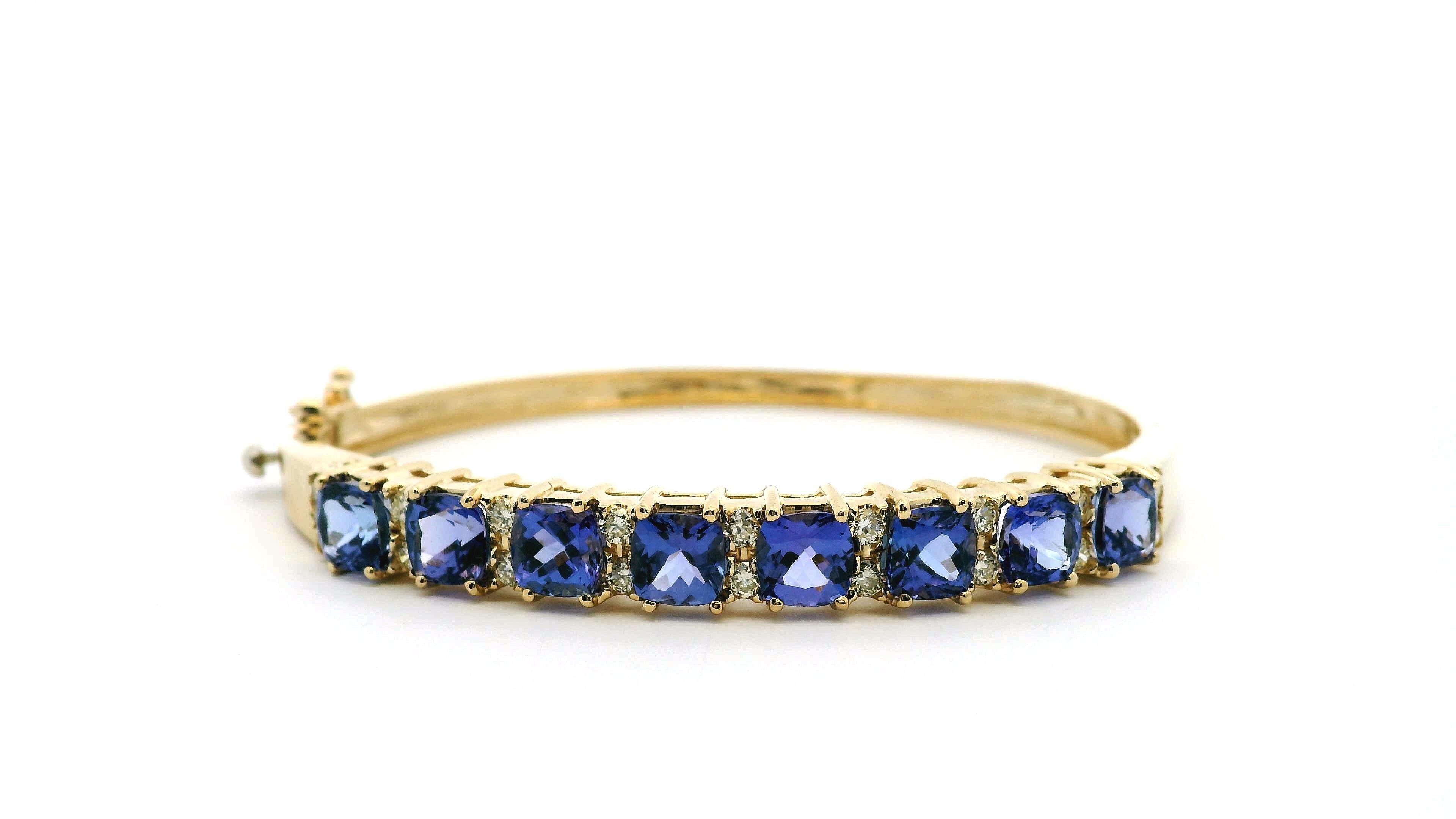 14k Yellow Gold 7.10ctw Tanzanite and 0.65ctw Round Diamond Bangle In New Condition For Sale In Boca Raton, FL