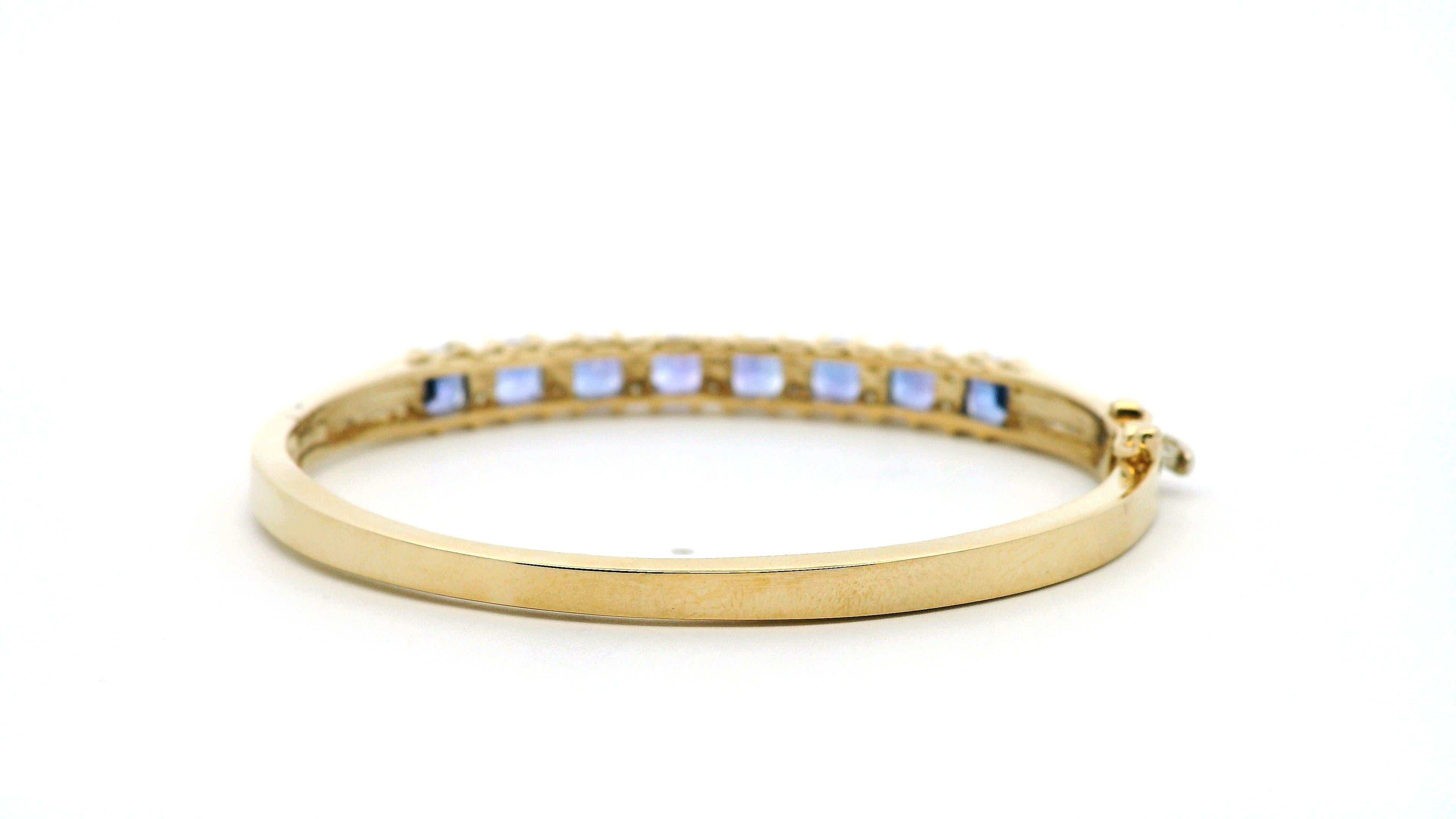 14k Yellow Gold 7.10ctw Tanzanite and 0.65ctw Round Diamond Bangle For Sale 1