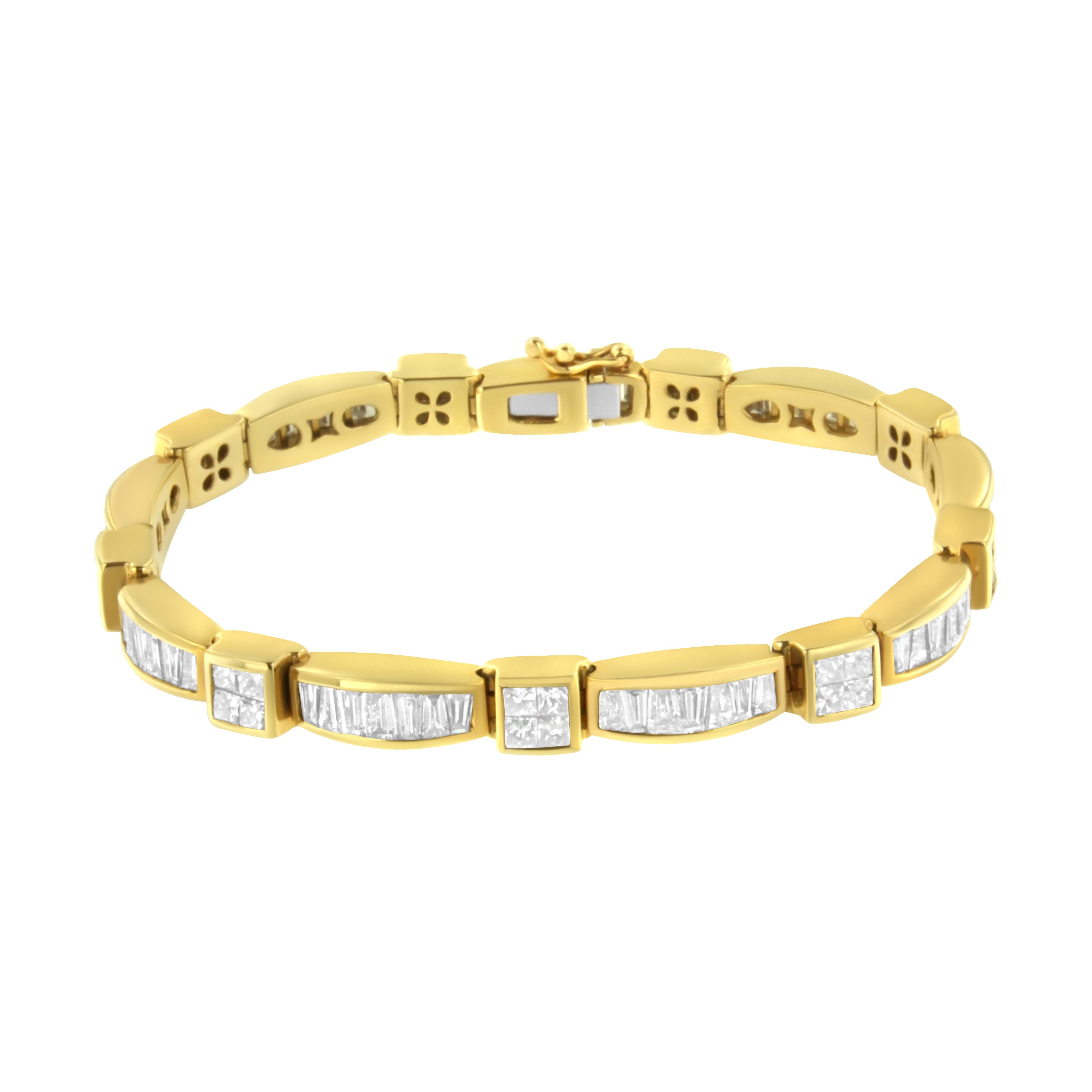 A glossy 14 karat yellow gold band is the perfect backdrop for over 7 carats of princess cut and baguette cut diamonds, linked together in two distinctive geometric shapes. This piece is equally as stunning when worn for a special occasion or every