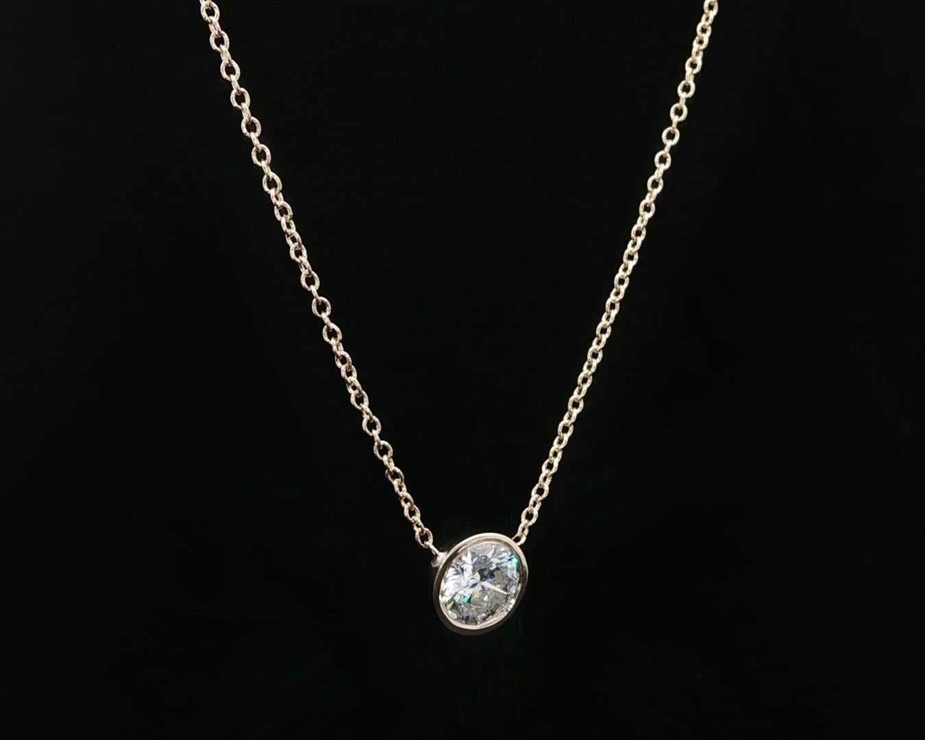 --Pierre(s) :...
(1) Diamant naturel véritable - rond brillant - serti - couleur G - pureté SI2 - 0,76ct (exact)

MATERIAL : Or jaune 14k massif
Poids : 2,1 grammes
Type de chaîne : Maillon Câble 
Longueur de la chaîne : Ajustable 18