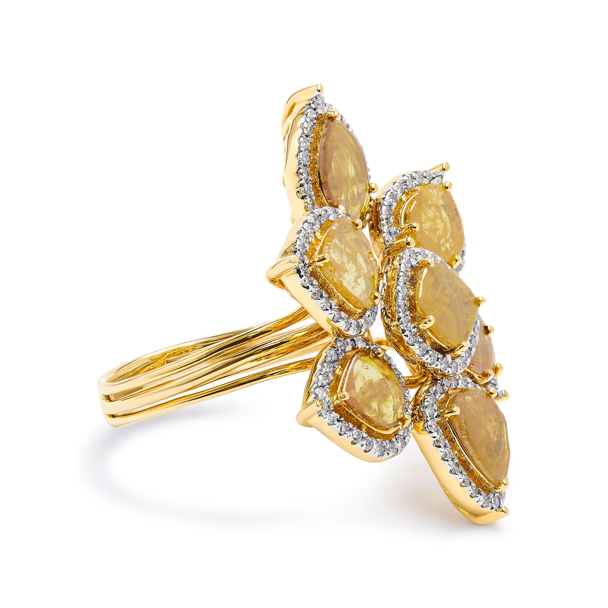 Introducing a mesmerizing masterpiece that will leave you breathless - a 14K Yellow Gold Floral Petal Cocktail Ring. Crafted with love and adorned with 207 exquisite diamonds, this ring is a true symbol of elegance and grace. The captivating design,