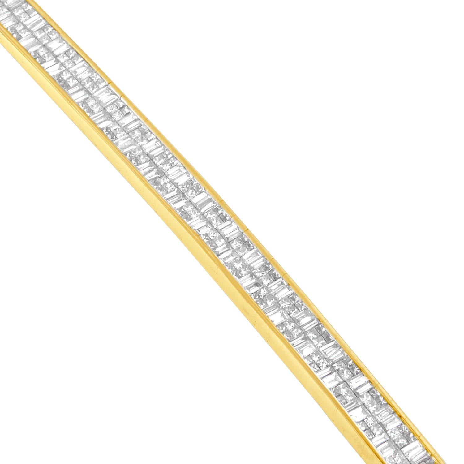 What a stunner!  This gorgeous 14k yellow gold eternity bracelet  showcases two rows of alternating baguette and princess cut diamonds.  Each link is carefully crafted to maximize brilliance while maintaining comfort.  Imagine fastening the box