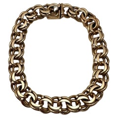 Bracelet en or jaune 14k 8" avec breloques traditionnelles, fermoir de sécurité en forme de 8