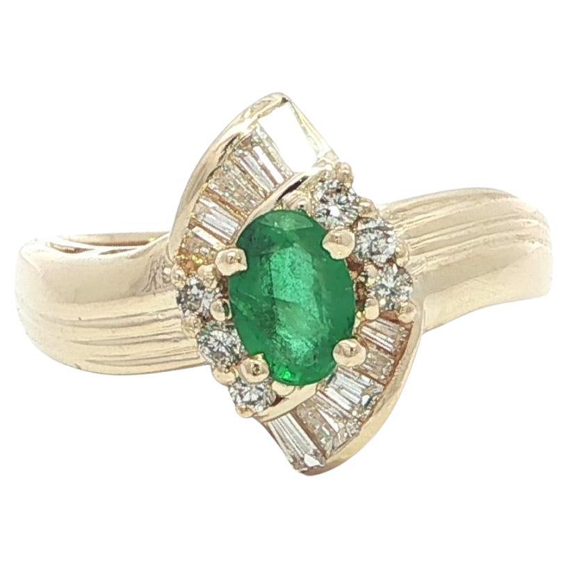 14k Yellow Gold .82ct Oval Emerald Baguette & Round Diamond Grooved Ring For Sale