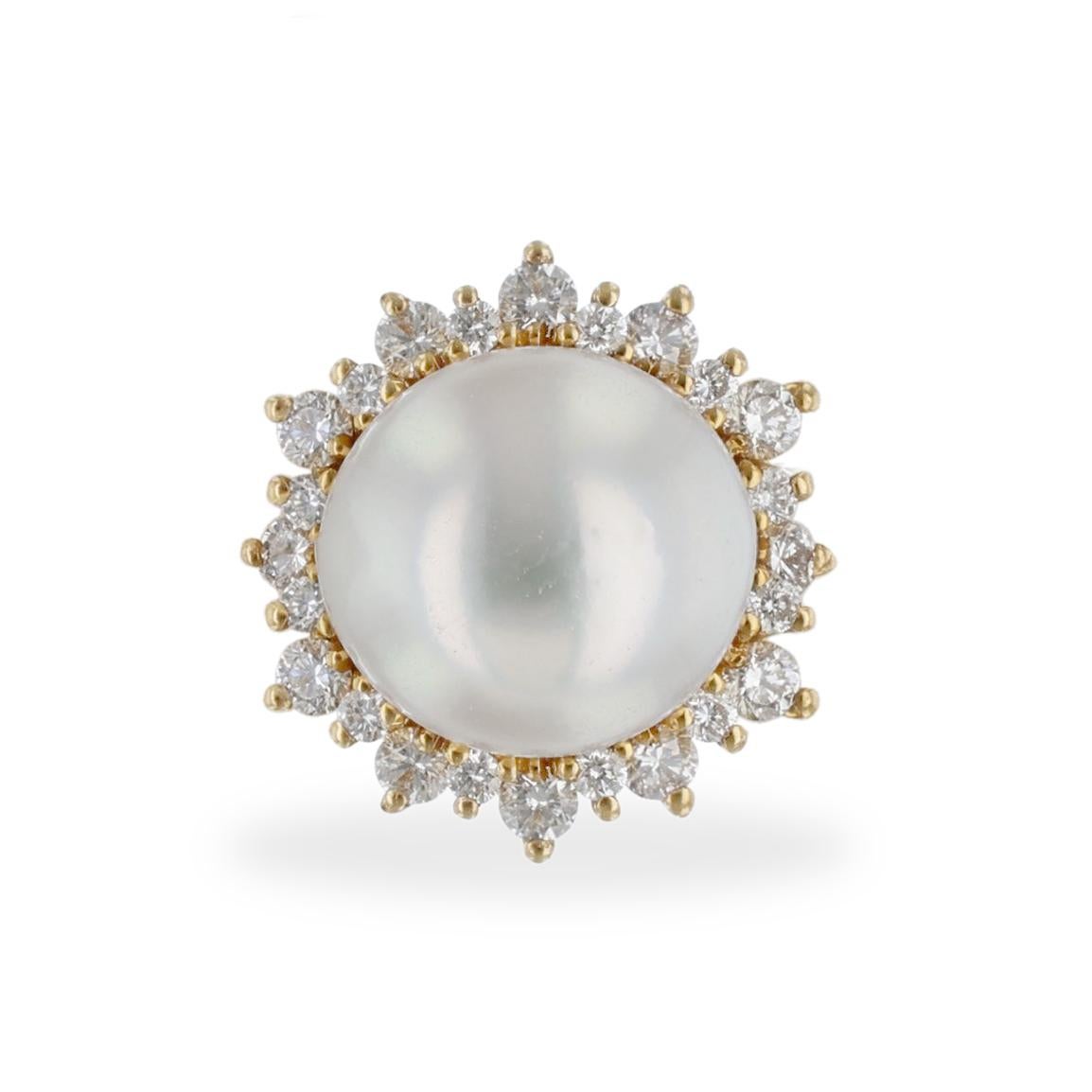 These stud earrings are made in 14K yellow gold and feature two 9 millimeter cultured pearls with 48 round cut diamonds weighing 0.61 carats combined. Post Backing.

