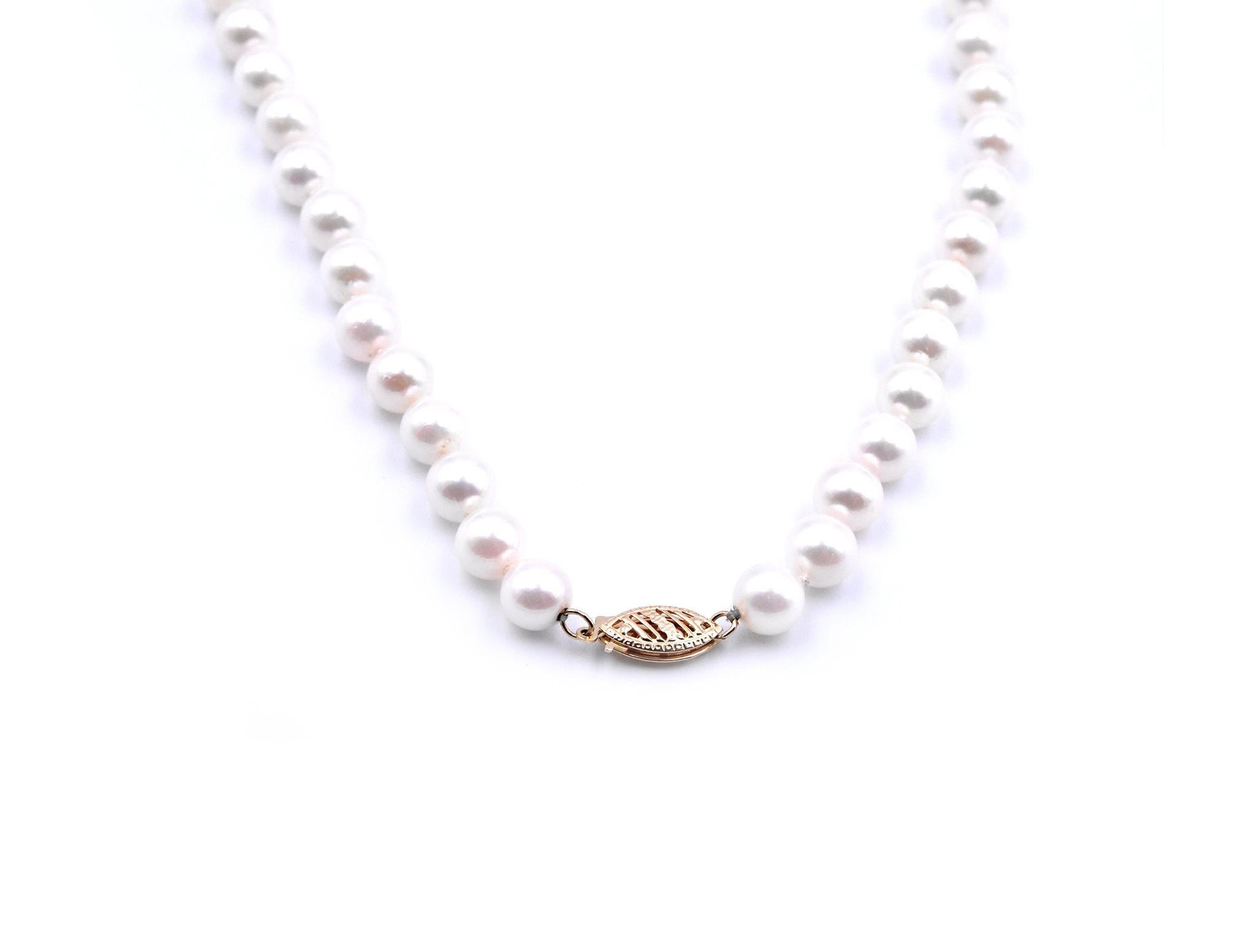 Designer: custom design 
Material: 14k yellow gold
Pearls: 6.55mm akoya cultured pearls
Dimensions: necklace measures 18 inches in length
Weight: 26.94 grams
