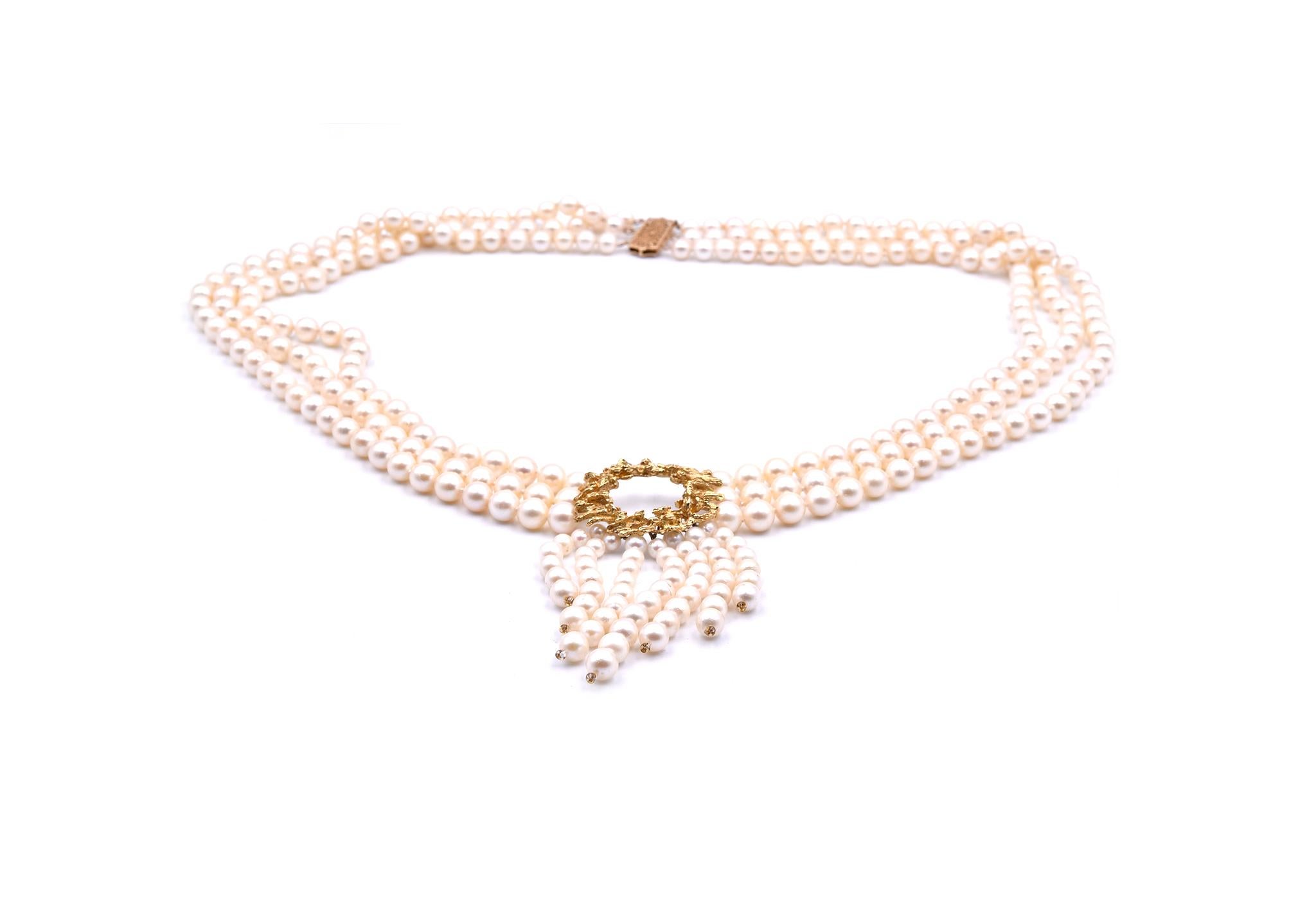 Designer: custom design
Material: 14k yellow gold
Akoya pearl: 6.75-7mm round Akoya cultured pearl
Dimensions: necklace is 30-inch long, gold centerpiece is 37.94mm wide
Weight: 130.04 grams
