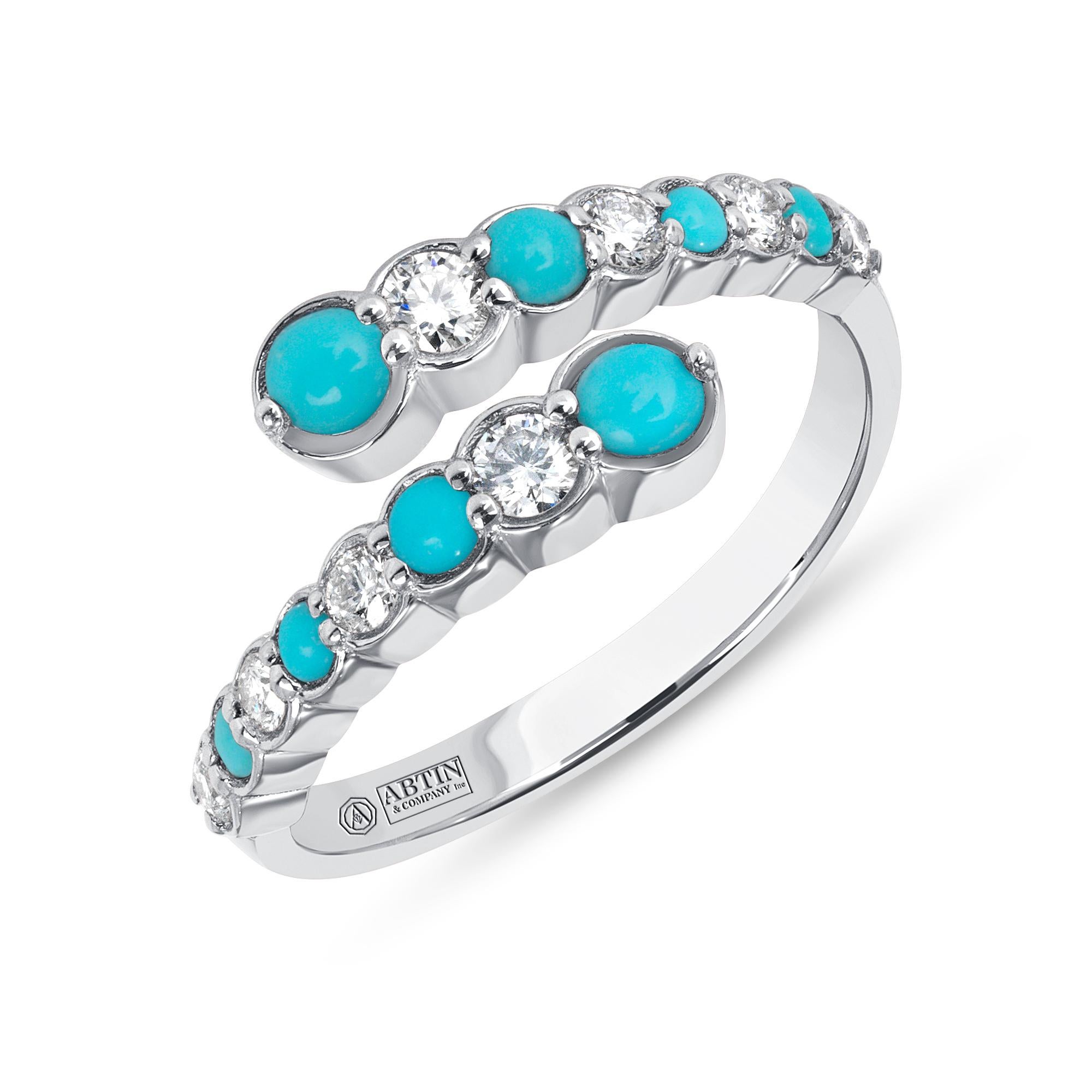 Crafted in 14K gold this ring features a clean and contemporary design. This modern and stylish open bypass alternating ring is set with mesmerizing round-cut diamonds and genuine turquoise gemstones. Stack it with your stacking rings or wear it