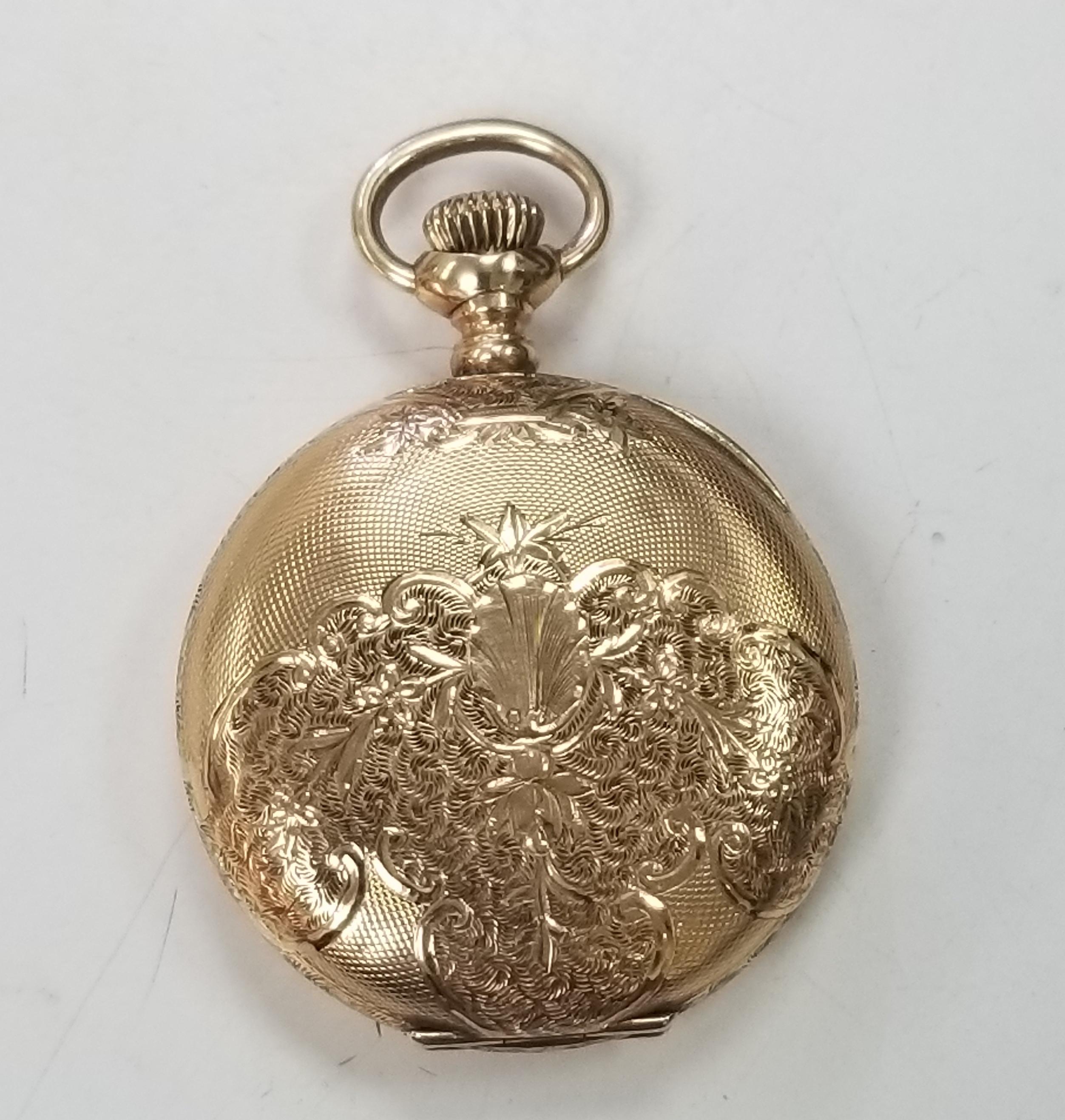 Absolutely beautiful pocket watch.  Made by American Watch Co. WALTHAM 1900s.  Heavy gauge 14K yellow gold.  In pristine crisp condition.  Hand engrave both front and back. Hunting case. 17 jewels.  Manual wind.  White enamel dial with black enamel