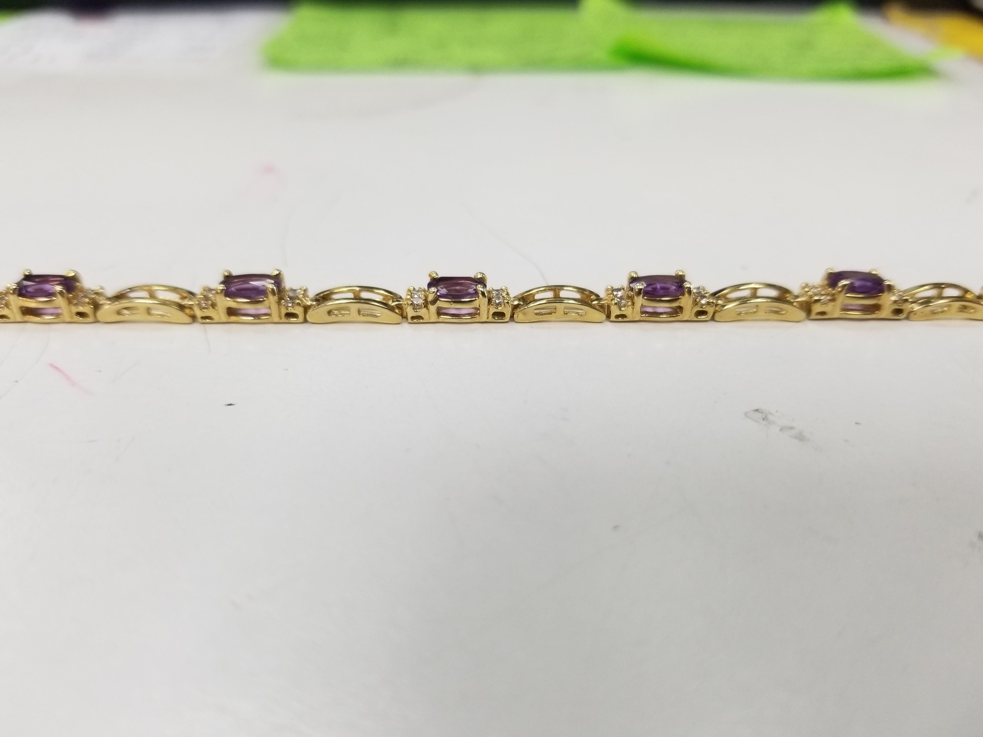 14k yellow gold amethyst and diamond bracelet, containing 8 oval cut amethyst of gem quality weighing 2.77cts. and 32 round full cut diamonds; color 