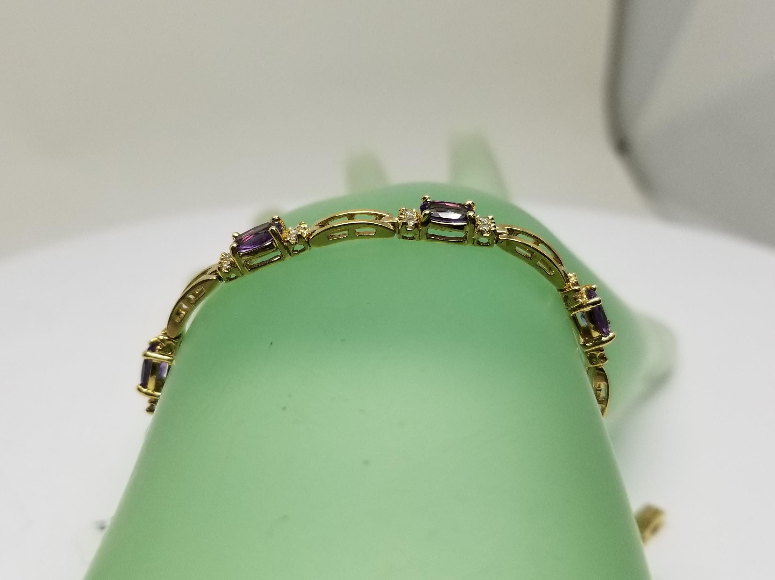 Oval Cut 14 Karat Yellow Gold Amethyst and Diamond Bracelet For Sale