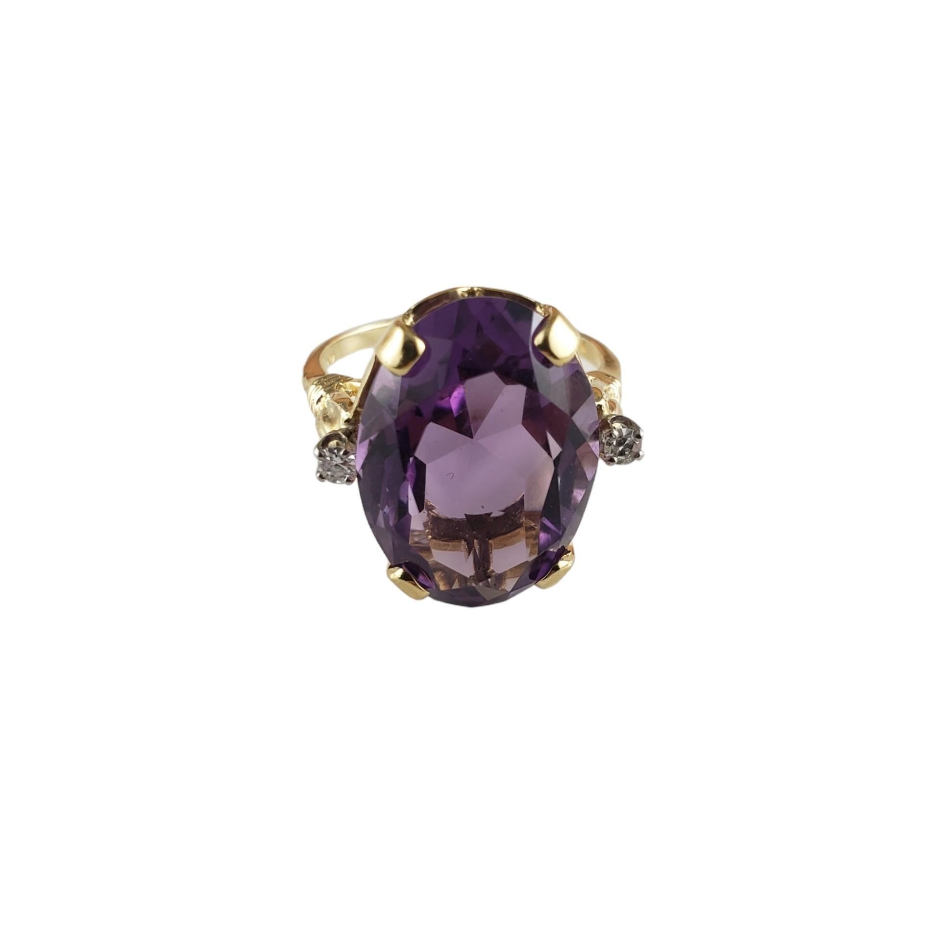 Vintage 14K Yellow Gold Amethyst and Diamond Ring Size 7 Lab Certified-

This lovely ring features one oval amethyst stone (17.8 mm x 13.9 mm) and two round single cut diamonds set in classic 14K yellow gold.  

Amethyst weight: 11.5 ct.

Total