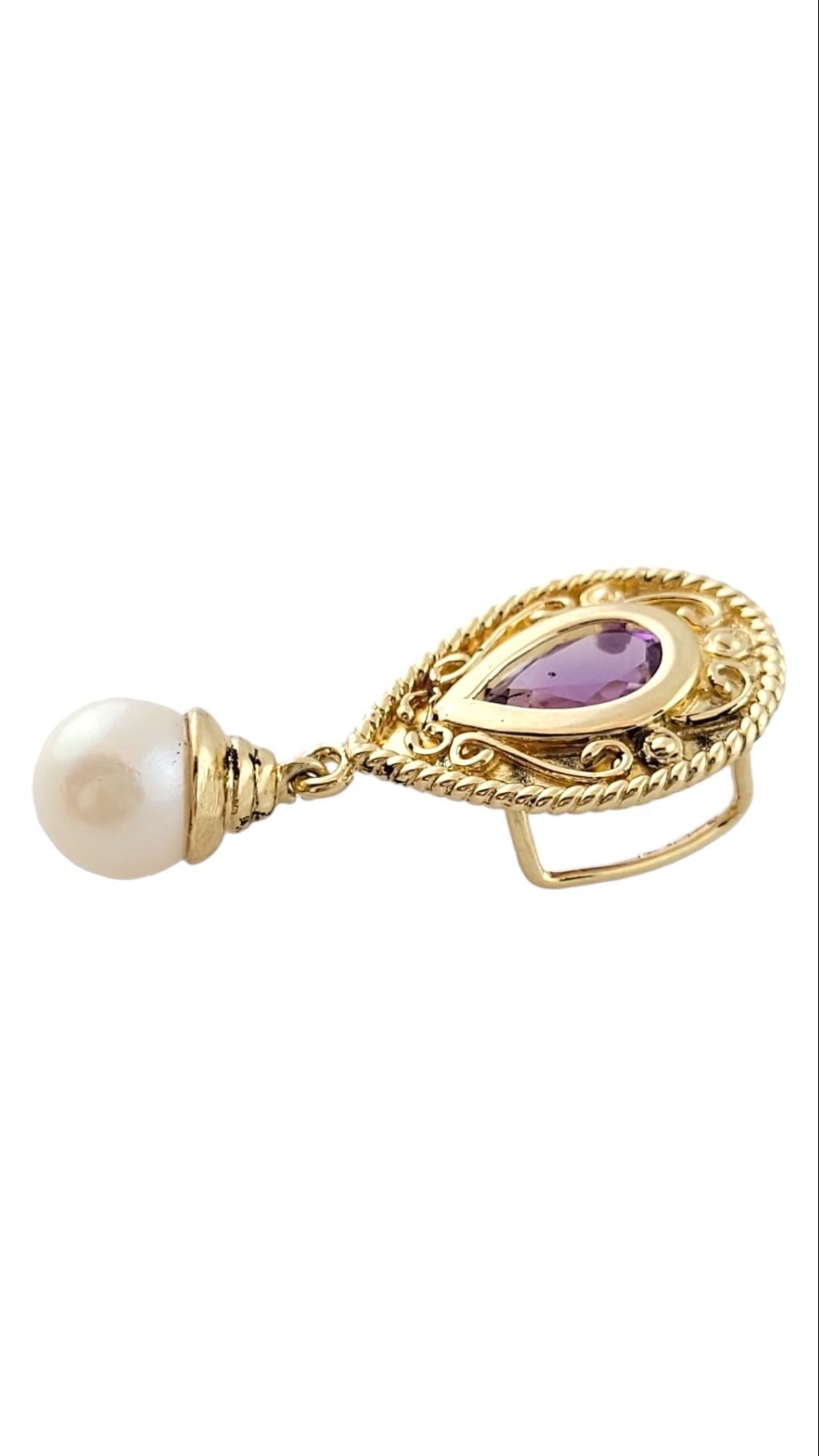 Vintage 14K Yellow Gold Amethyst and Pearl Pendant

This gorgeous pendant features a beautiful purple amethyst stone and a hanging, cultured freshwater pearl!

Pearl: 6.9mm

Size: 29.5mm X 13.4mm X 6.9mm

Weight: 2.5 g/ 1.6 dwt

Hallmark: