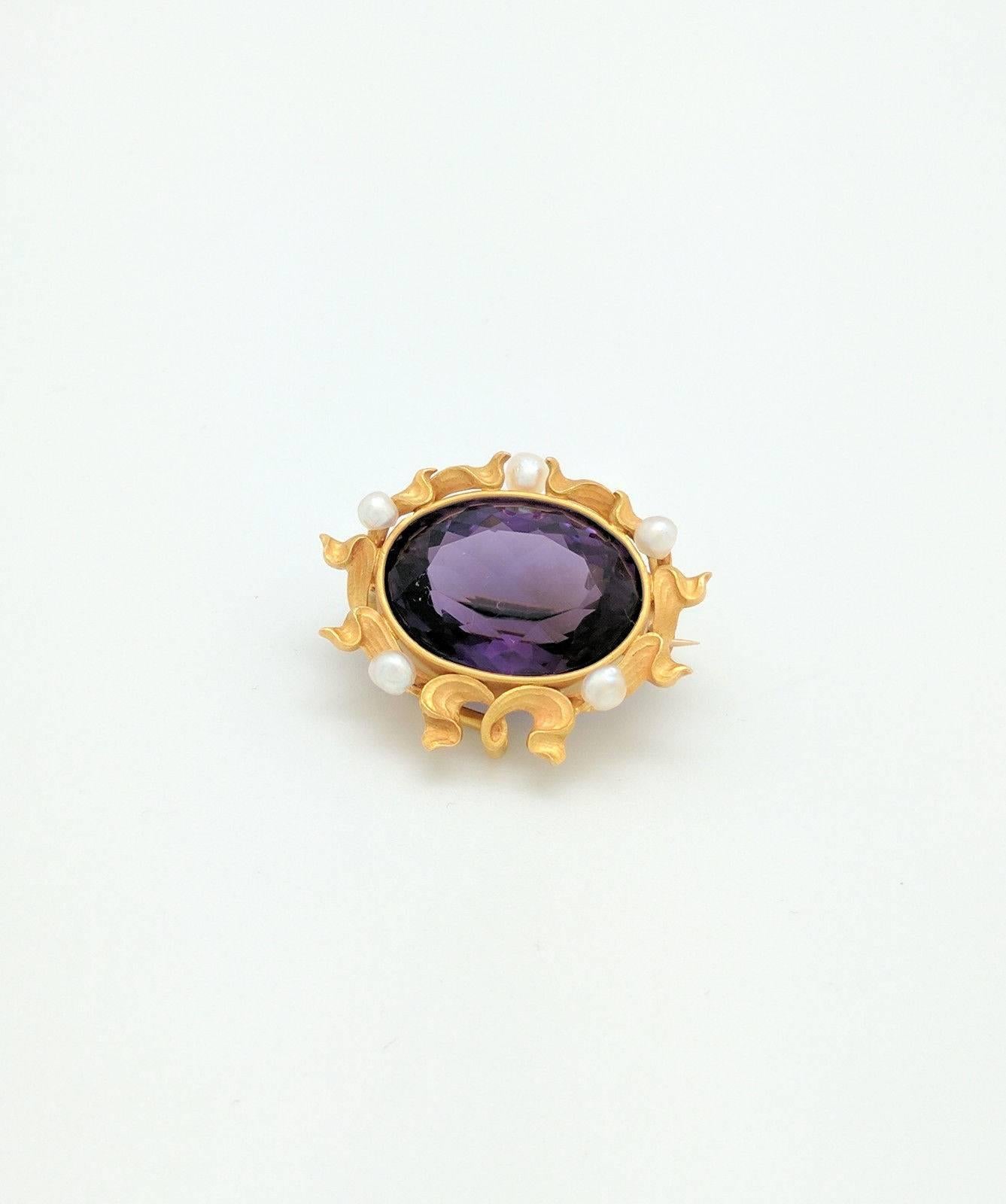 Vintage 14k Yellow Gold Amethyst and Seed Pearl Brooch Pin

You are viewing a Beautiful Vintage Amethyst & Seed Pearl Brooch Pin.  This brooch is crafted from 14k yellow gold and weigh 9.9 grams. It features (1) 20mm x 15mm natural oval shaped