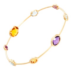 14 Karat Yellow Gold Amethyst, Aquamarine and Citrine Bracelet