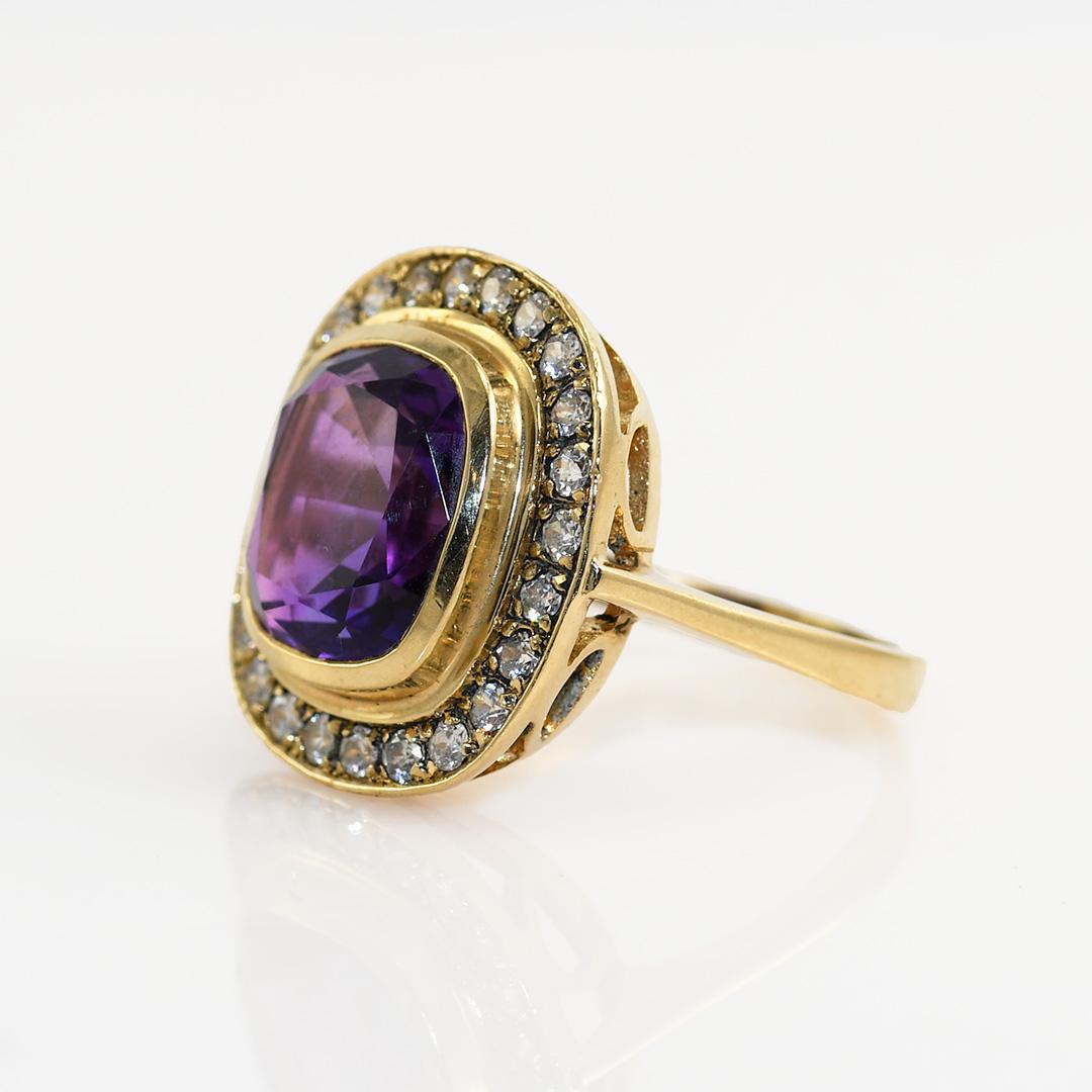 14k yellow gold ring with Amethyst and CZ's

Stamped 14k, tests 57.5% on x-ray gun, weighs 5.2gr

Size 5 1/4


