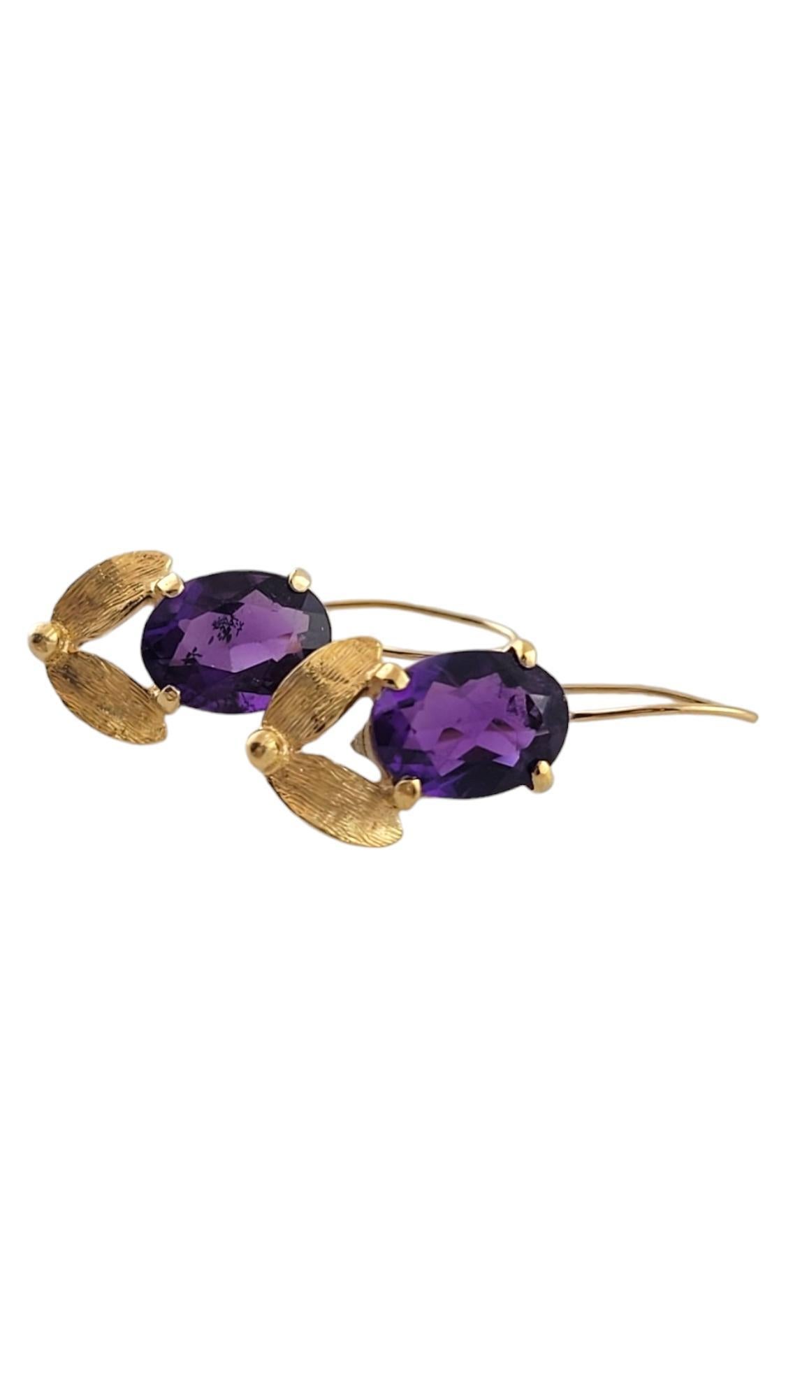14K Yellow Gold Amethyst Dangle Earrings

This gorgeous set of 14K yellow gold dangle earrings features two stunning amethyst stones that will make your ears pop!

Size: 23.48mm X 9.37mm X 4.88mm

Weight: 1.64 dwt/ 2.55 g

Hallmark: 14K

*JAGI