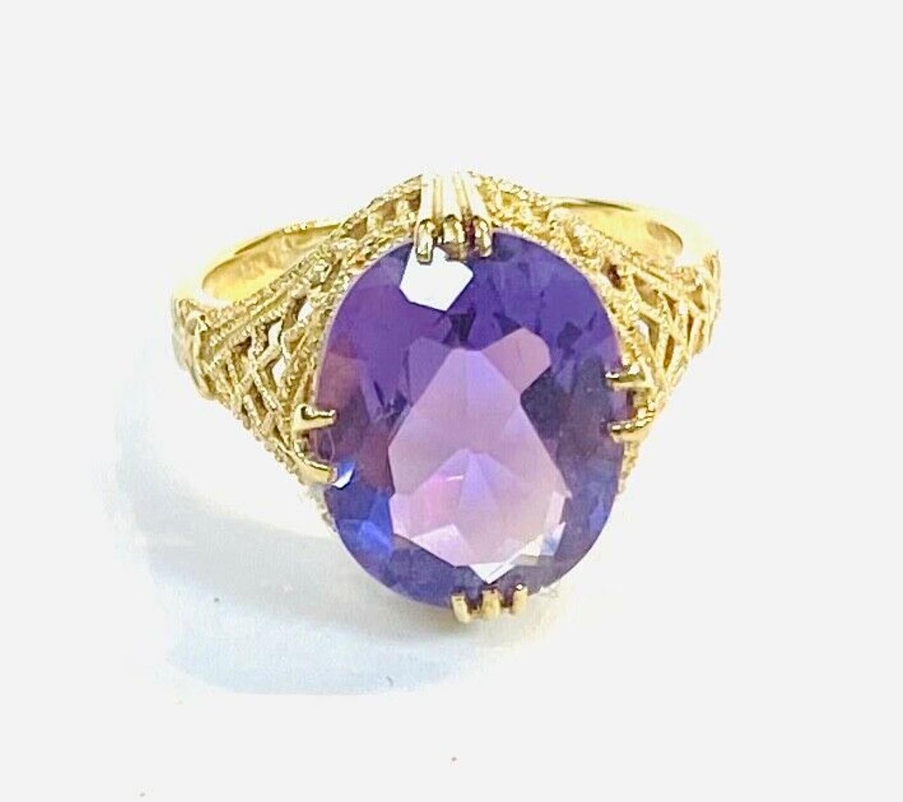 Women's 14K Yellow Gold Amethyst Ring Approximately 5 Carats For Sale