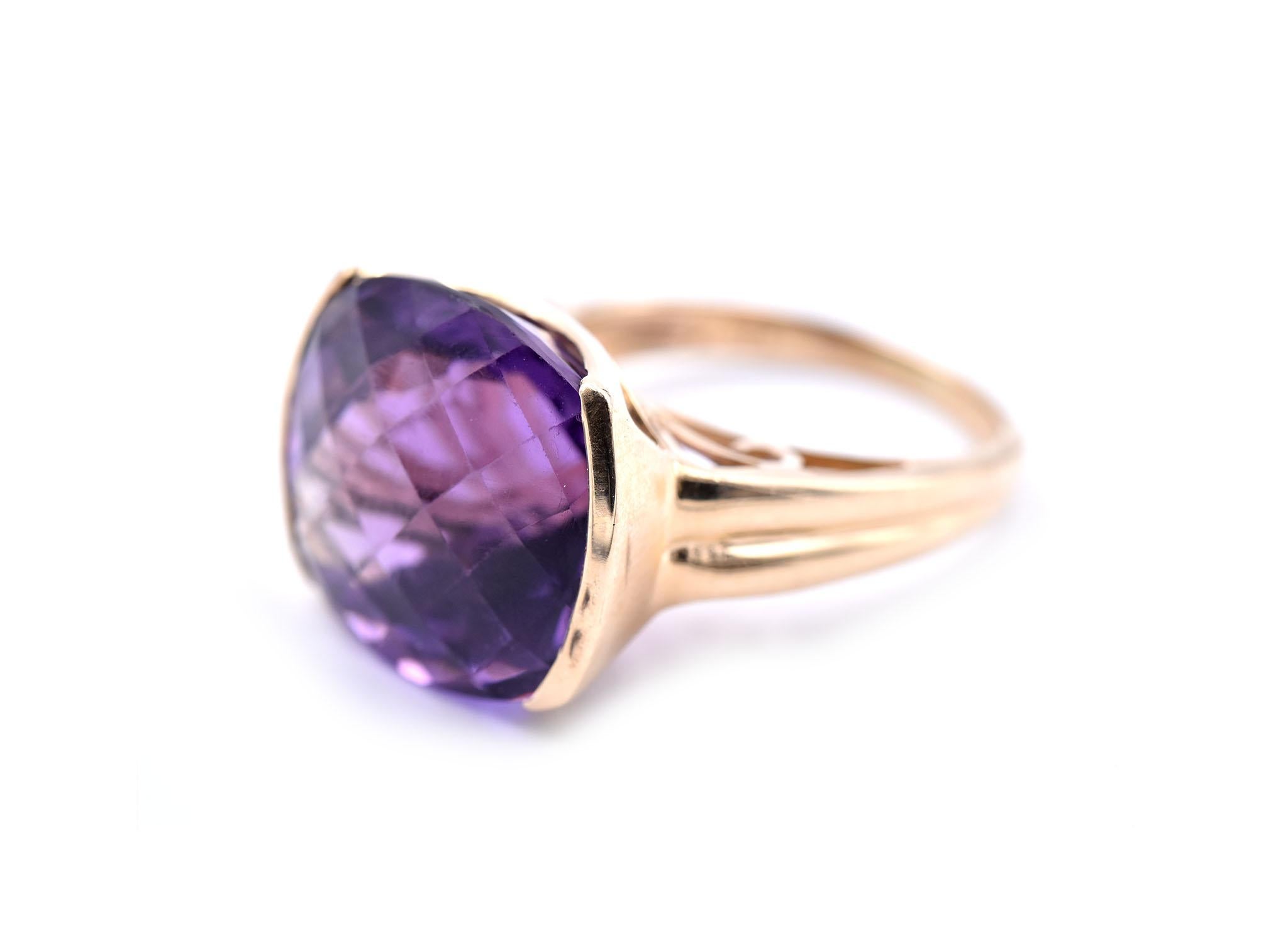 Designer: custom
Material: 14k yellow gold
Amethyst: 1 cushion cut=14.37ct
Ring size: 8 (please allow two additional shipping days for sizing requests)
Dimensions: ring top is 15.28mm by 17.78mm
Weight: 8.21 grams
