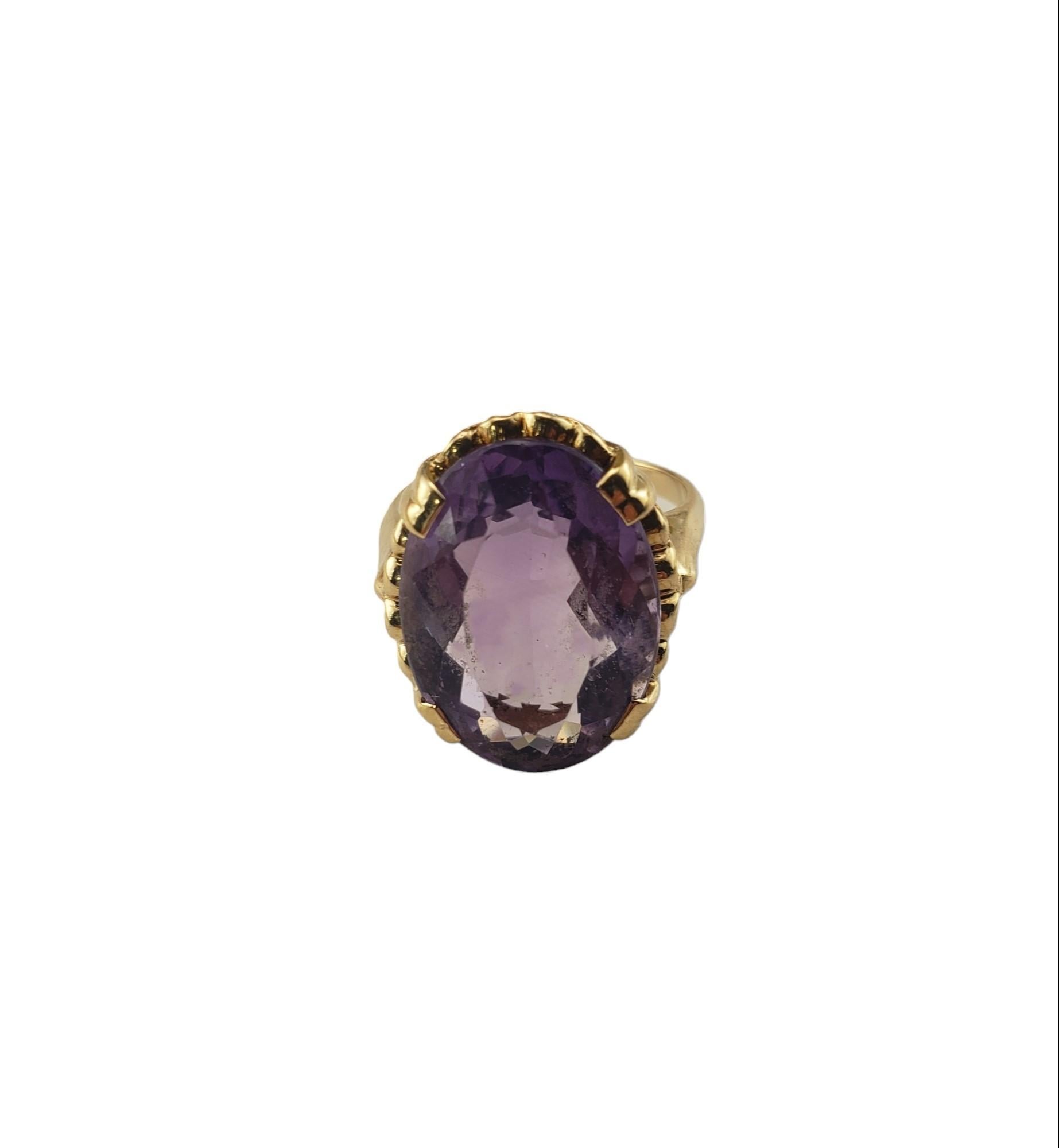 Vintage 14K Yellow Gold Amethyst Ring Size 6.75 JAGi Certified-

This elegant ring features one oval cut amethyst (17.8 mm x 13.1 mm)set in beautifully detailed 14K yellow gold.  Width:  19.8 mm.  Shank: 2.2 mm.

Amethyst weight:  10.0 ct.

Ring