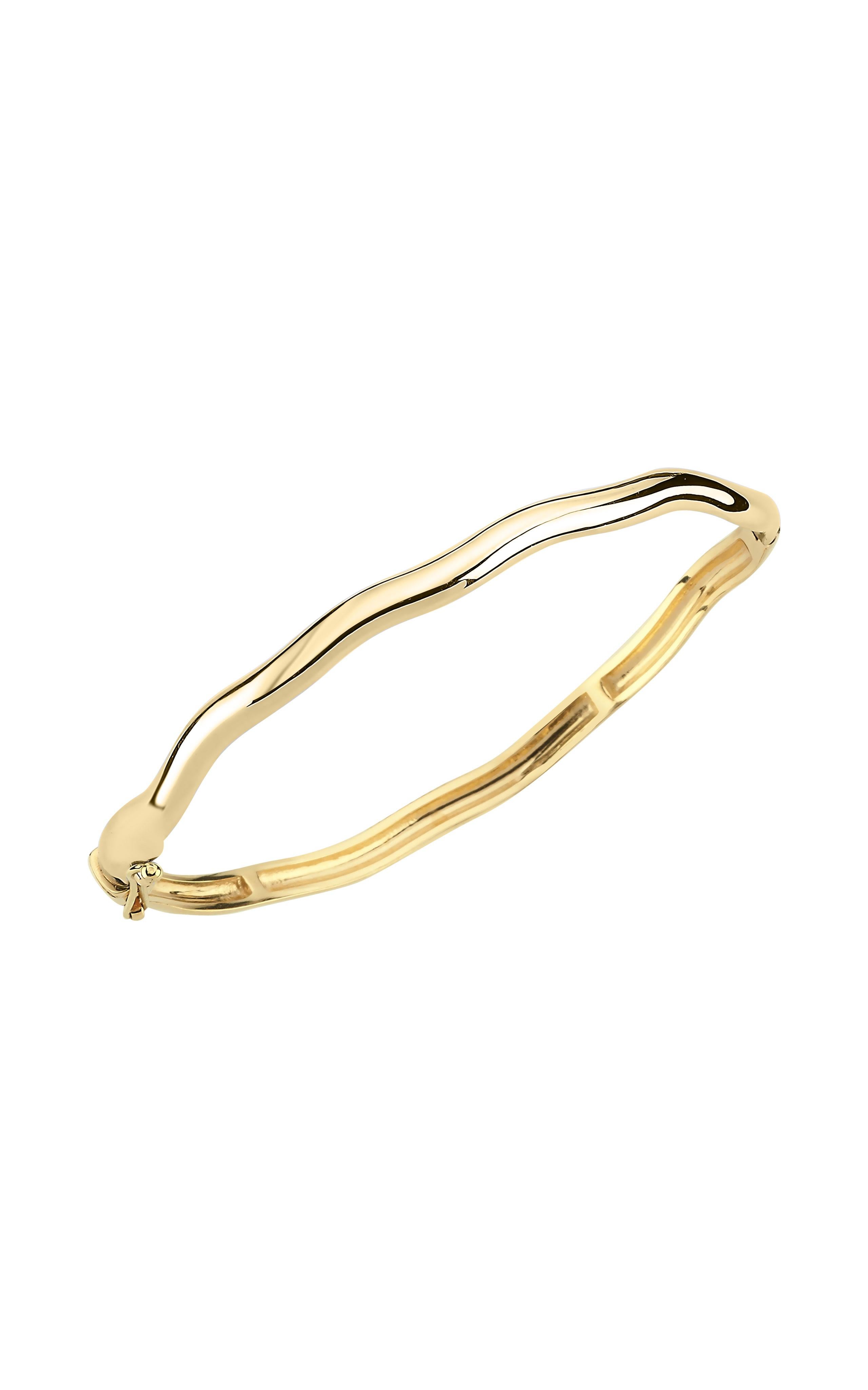 Ces magnifiques bracelets en forme d'amorphe peuvent être portés empilés ou seuls pour un look classique. 