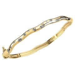 Bracciale Amorph in oro giallo 14k con diamanti da 0,26 carati