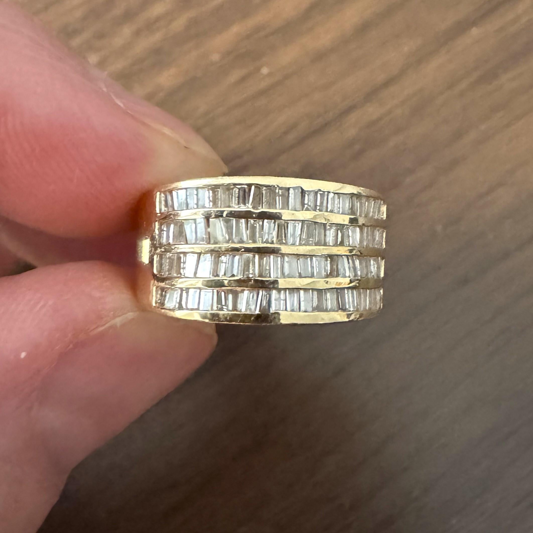Condition:  Excellent Condition, Professionally Cleaned and Polished
Metal:  14k Gold (Marked, and Professionally Tested)
Weight:  6.2g
Diamonds:  Natural Baguette Cut Diamonds 0.75cttw
Width:  10mm at widest, 4.5mm at narrowest
Size: 