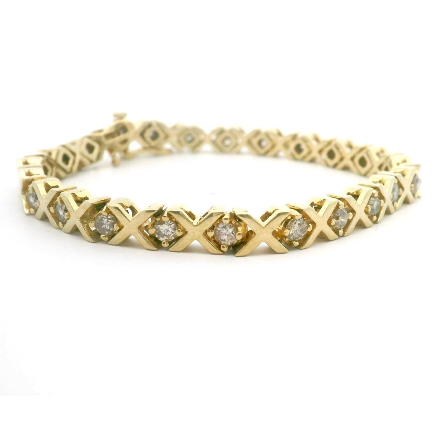 Condition:  Excellent Condition, Professionally Cleaned and Polished
Metal:  14k Gold (Marked, and Professionally Tested)
Weight:  25.6g
Length:  7.25 Inches
Width:  5.5mm
Diamonds:  Round Cut Natural Diamonds 2.5cttw
Diamond Color and Clarity:  H-I