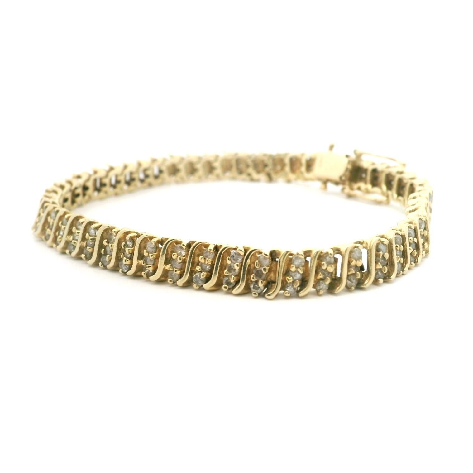Condition:  Excellent Condition, Professionally Cleaned and Polished
Metal:  14k Gold (Marked, and Professionally Tested)
Weight:  17.4g
Length:  7.5 Inches
Width:  6mm
Diamonds:  Round Cut Natural Diamonds 3.5cttw
Diamond Color and Clarity:  J-K