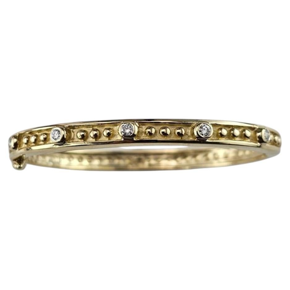 Bracciale rigido in oro giallo 14 carati con diamanti #25594