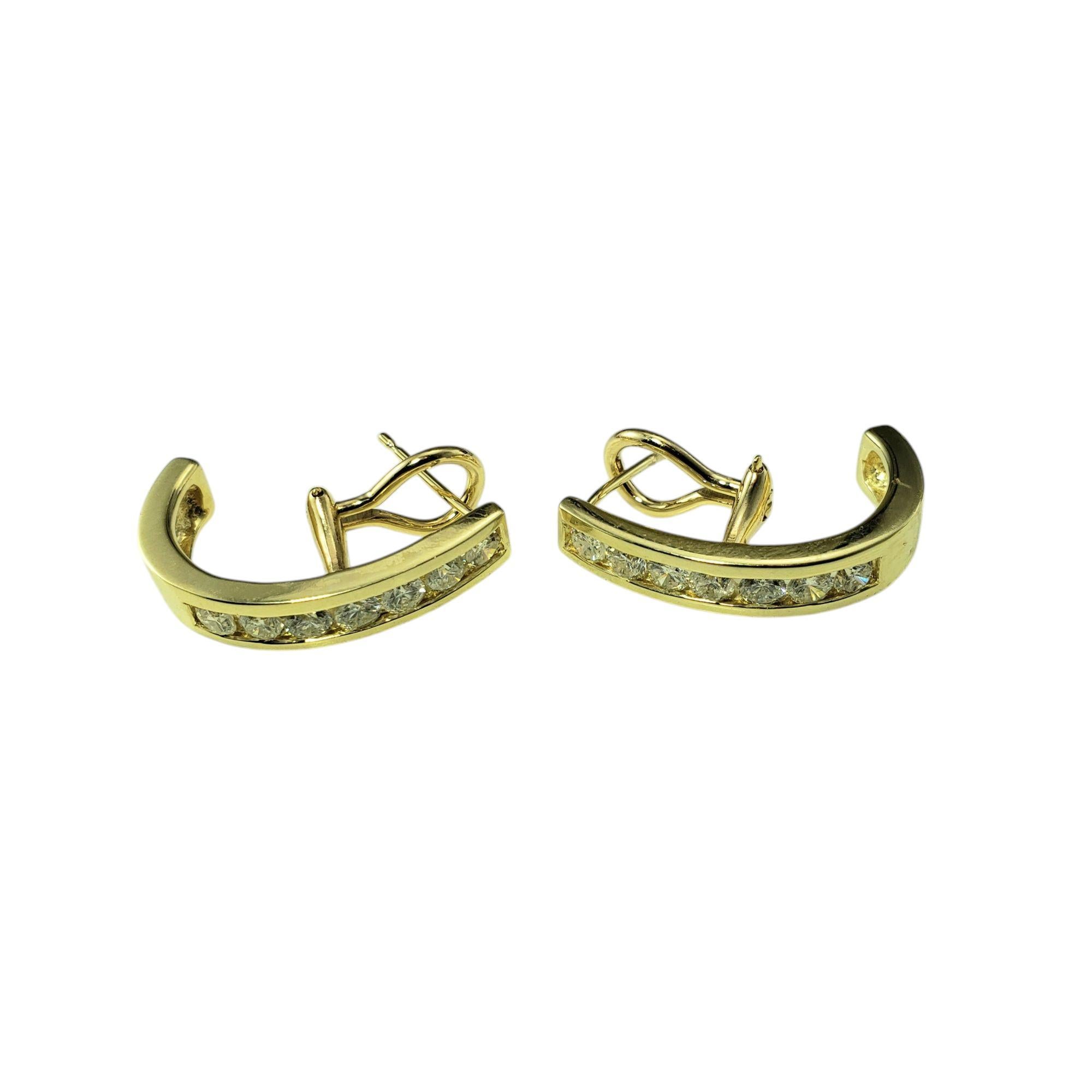 14K Yellow Gold and Diamond Half Hoop Omega Back Earrings-

These sparkling earrings each feature seven round brilliant cut diamonds set in classic 14K yellow gold. Omega back closures.

Approximate total diamond weight: .95 - 1.12 ct.

Diamond