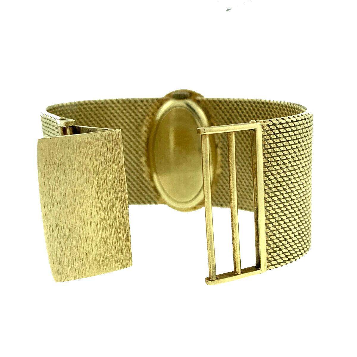 Ovale Vintage-Damenuhr aus 14 Karat Gelbgold und Diamanten im Angebot 4