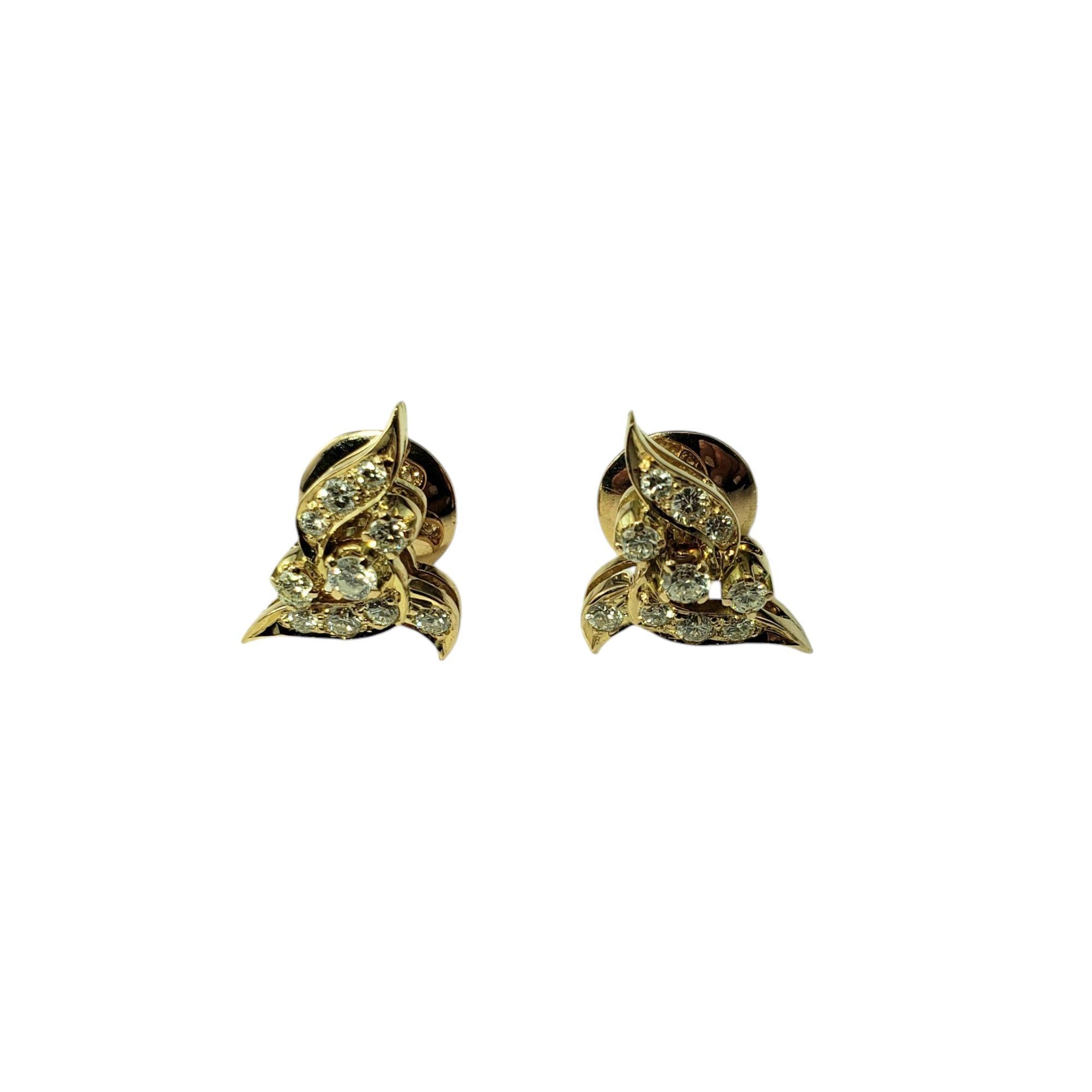14K Yellow Gold and Diamond Stud Earrings-

These sparkling earrings each feature 20 round brilliant cut diamonds set in beautifully detailed 14K yellow gold. Screw back closures.

Approximate total diamond weight: 35 - .40 ct.

Diamond color: