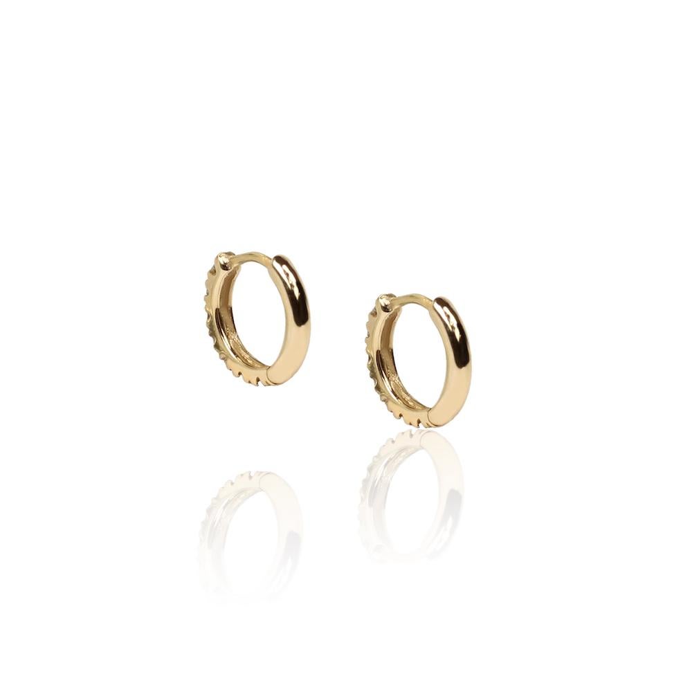 Simple, classic, and beautiful Huggies made with 14k gold and 1 point diamonds are the perfect everyday earrings accessory. 

* 14k Gold
* Authenticity & Guarantee Certificate
* Comes in a protective card box and felt bag