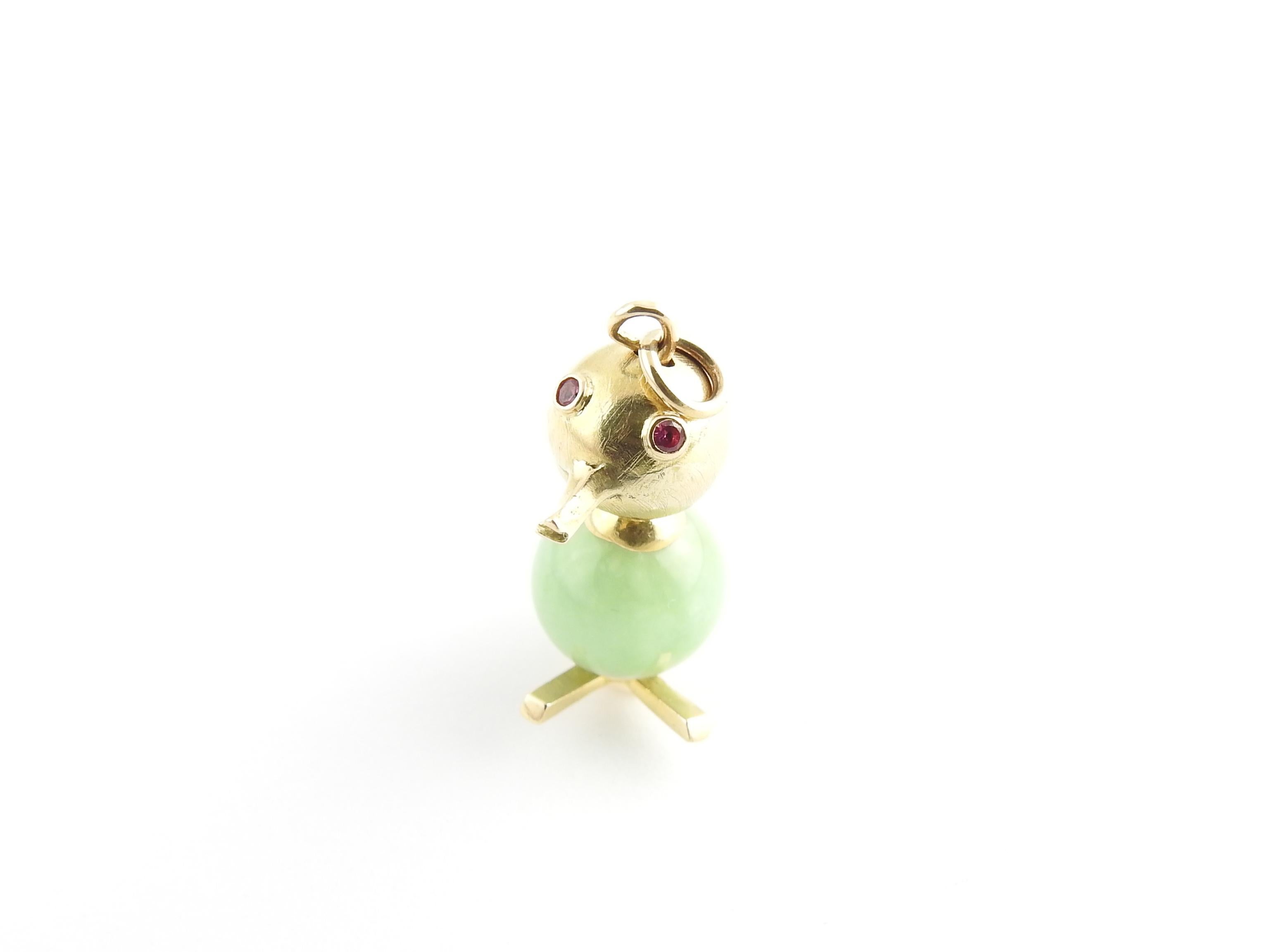 Vintage 14K Yellow Gold and Jade Duck Charm / Pendant with Red Eyes

This adorable 3D duck charm is approx. 25mm in length, 28mm with loop

Approx. 16mm wide at base

10.5mm jade stone, 2 mm ruby eyes

2.9 dwt / 4.6 g

Very good preowned