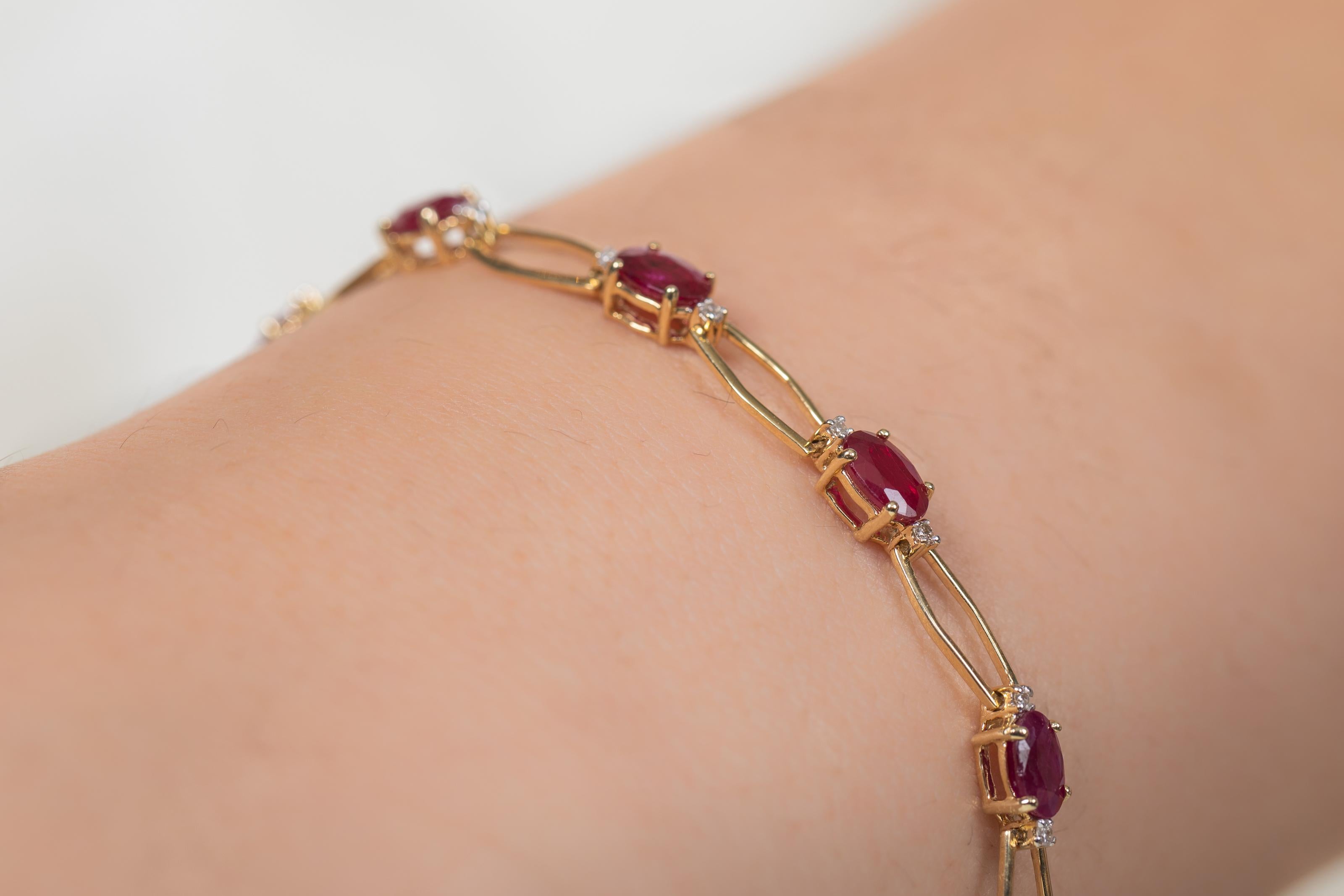 Oval Cut Unique Deep Red Ruby Tennis Bracelet with Diamonds in 14kt Solid Yellow Gold  For Sale