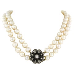 14k yellow Gold and silver lock with rose cut diamonds on a pearl bead necklace