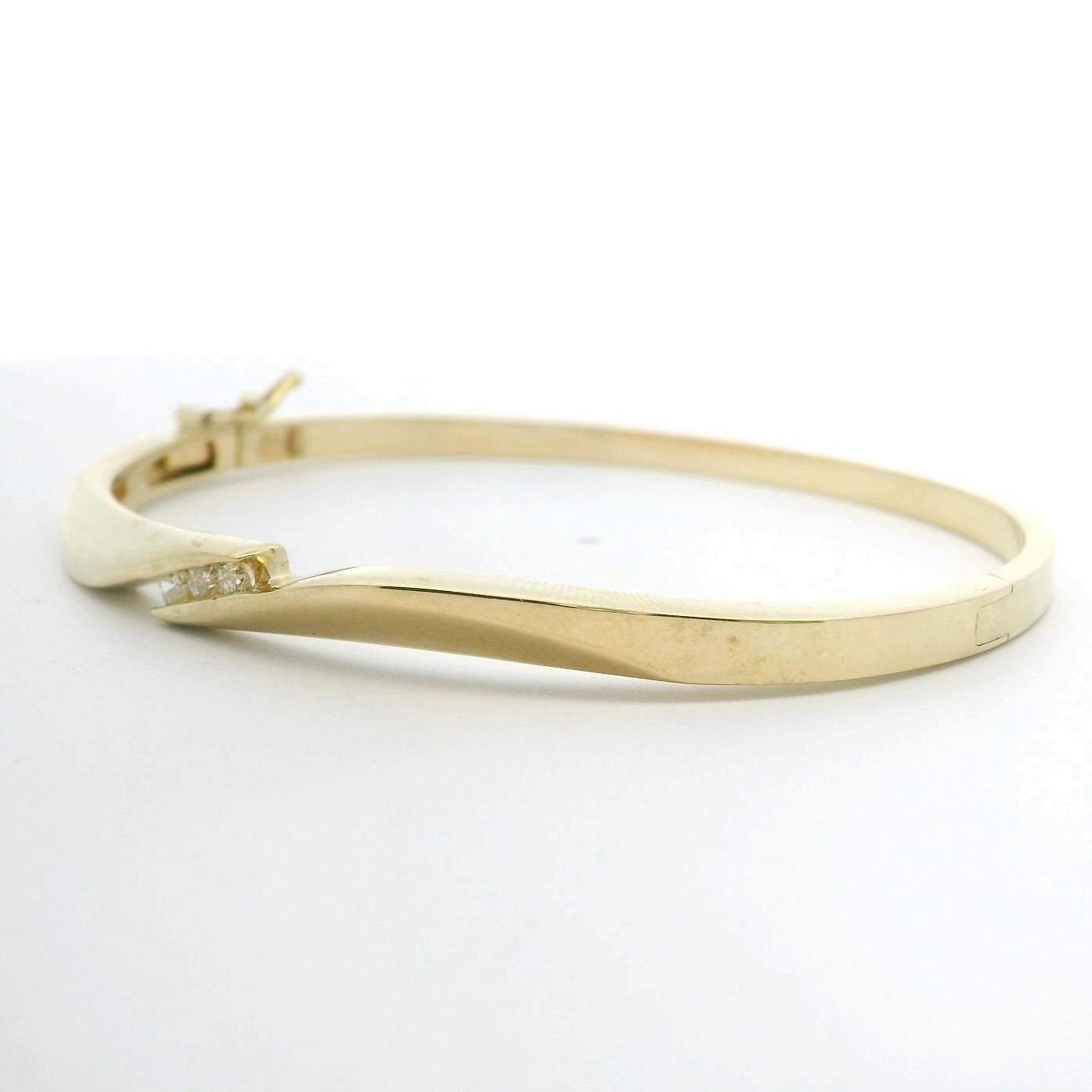 14k Gelbgold und drei Diamanten Bypass-Armreif Armband 6,75