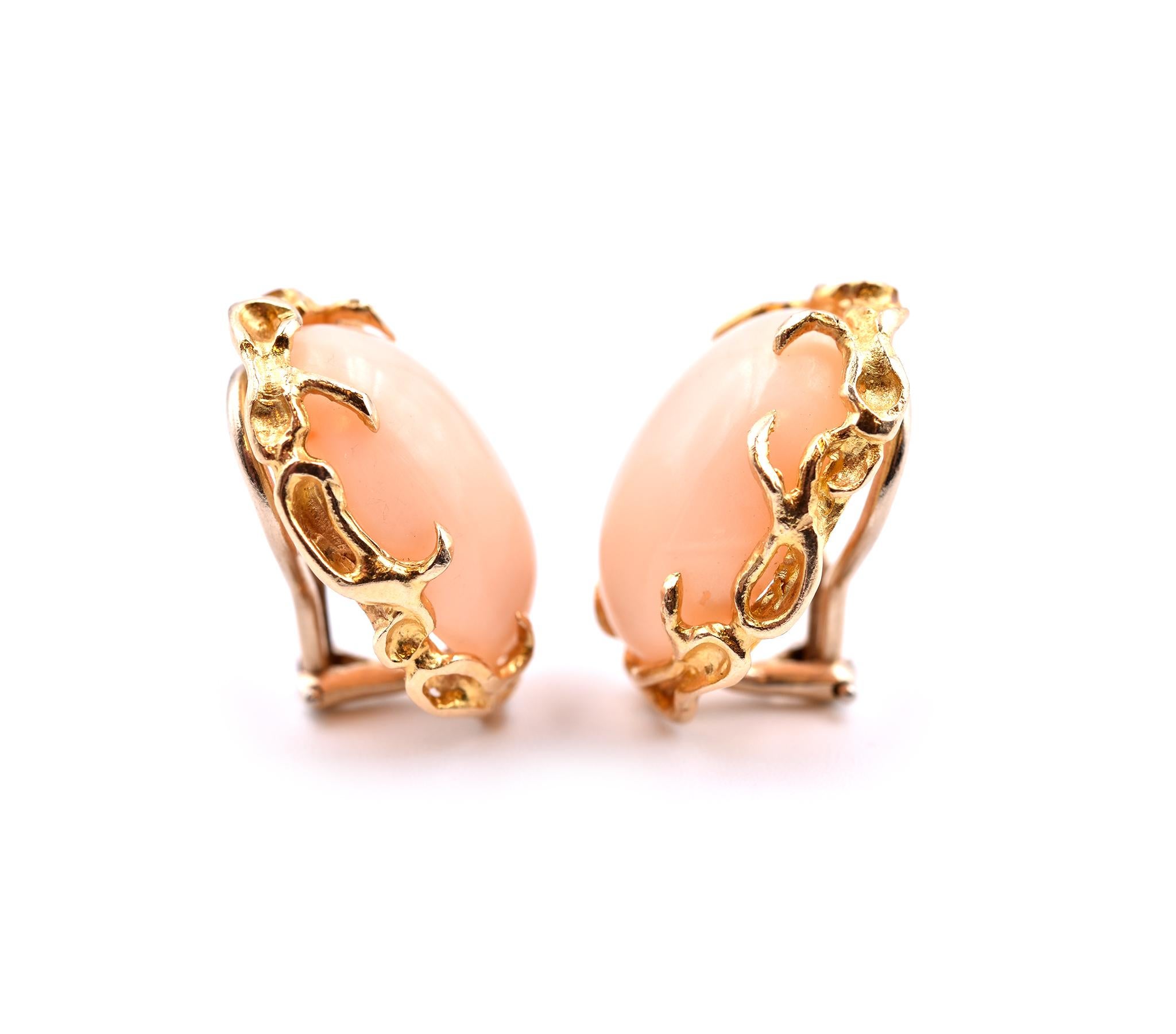 Designer: custom design
Material: 14k yellow gold
Dimensions: earrings measure approximately 22.71mm by 16.84mm
Fastenings: clip-on backs
Weight: 11.28 grams
