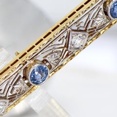 Broche antique en or jaune 14k avec diamants et saphirs