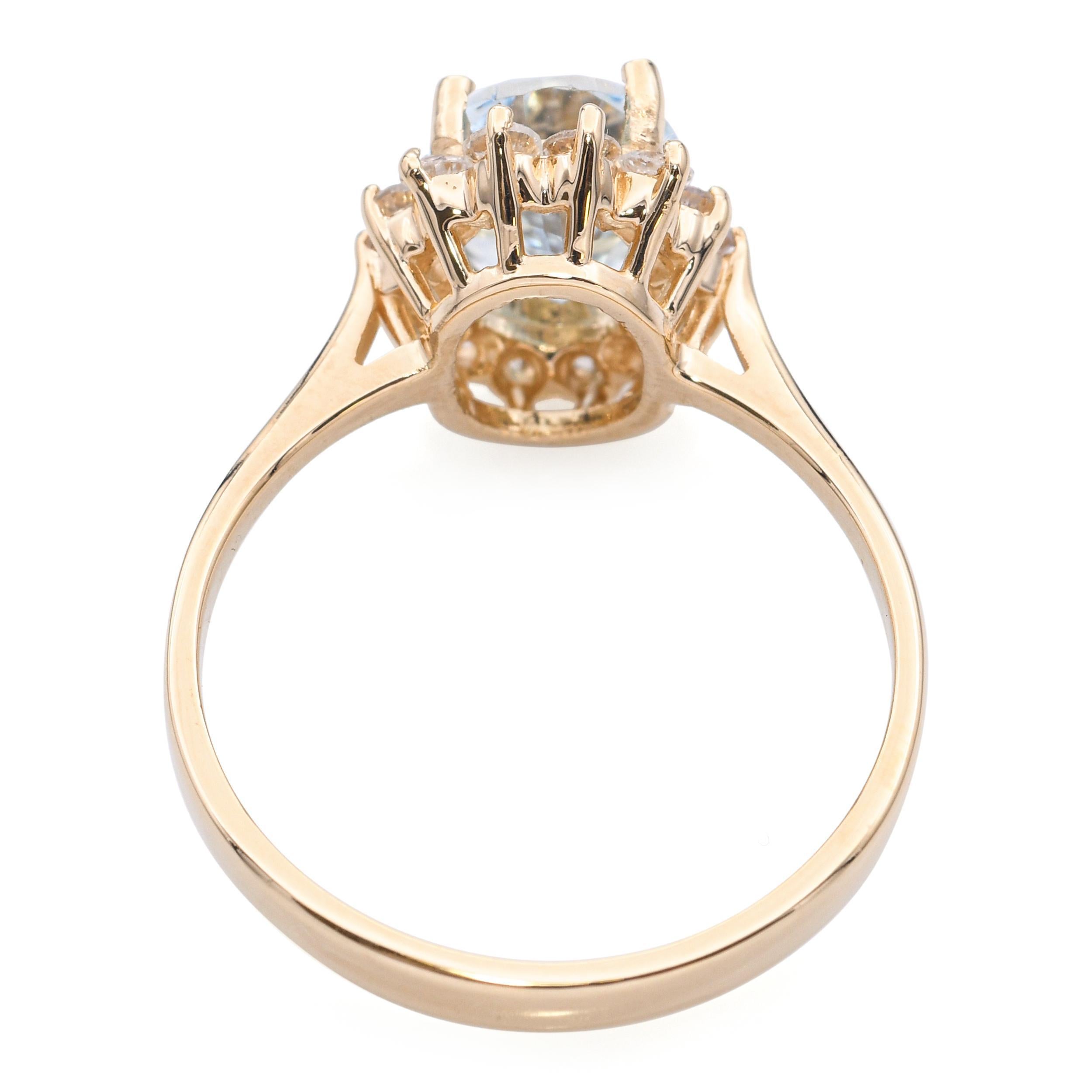 Bague en or jaune 14k avec halo d'aigue-marine et de diamant en vente 1